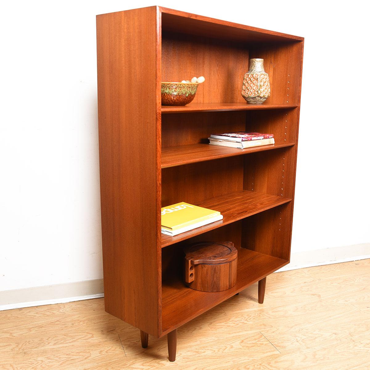 Danish Teak Adjustable Shelf Bookcase by Borge Mogensen

Additional information:
Material: Teak
Featured at Kensington:
Compact & functional with old school adjustable beveled shelves.

Dimension: W 39.25? x D 12.5? x H 52.5?