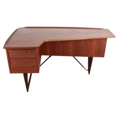 Bureau « Boomerang » en teck danois et laiton, conçu par Peter Lovig Nielsen, 1968.