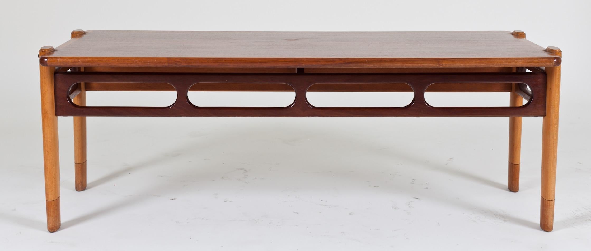 Danish teak and rosewood coffee table, 1960s. Small scale with carved oval details.
  