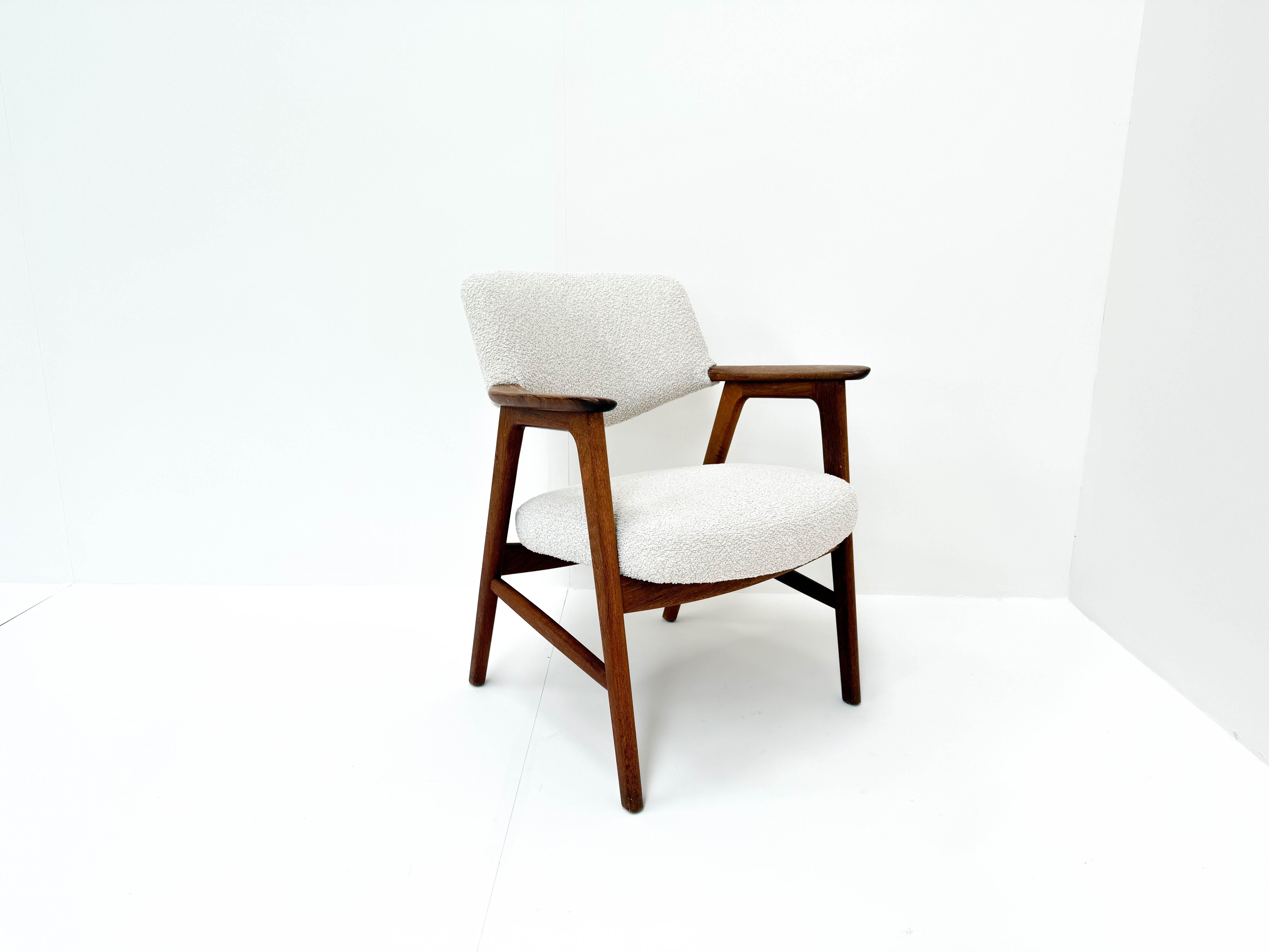 This beautifully crafted Danish armchair, designed by Erik Kirkegaard in the 1960s, model 42 is a quintessential piece of mid-century Scandinavian design. The sculptural frame in solid teak features elegantly curved armrests and refined joinery,