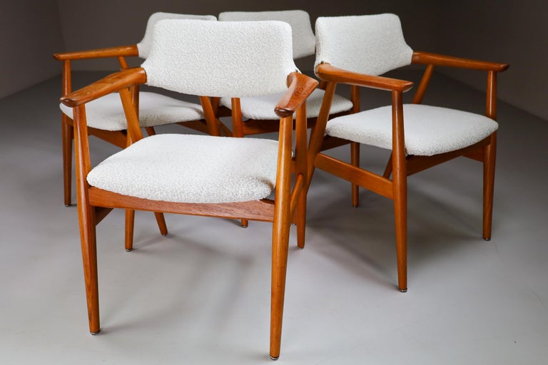 Set/4 Danish teak armchairs by Svend Aage Eriksen for Glostrup Møbelfabrik 1960s set, Beautiful Danish midcentury design. Model GM 11 in solid teak and new boucle wool fabric upholstery. Round tapered legs and sculpted armrests. Wide curved backrest
