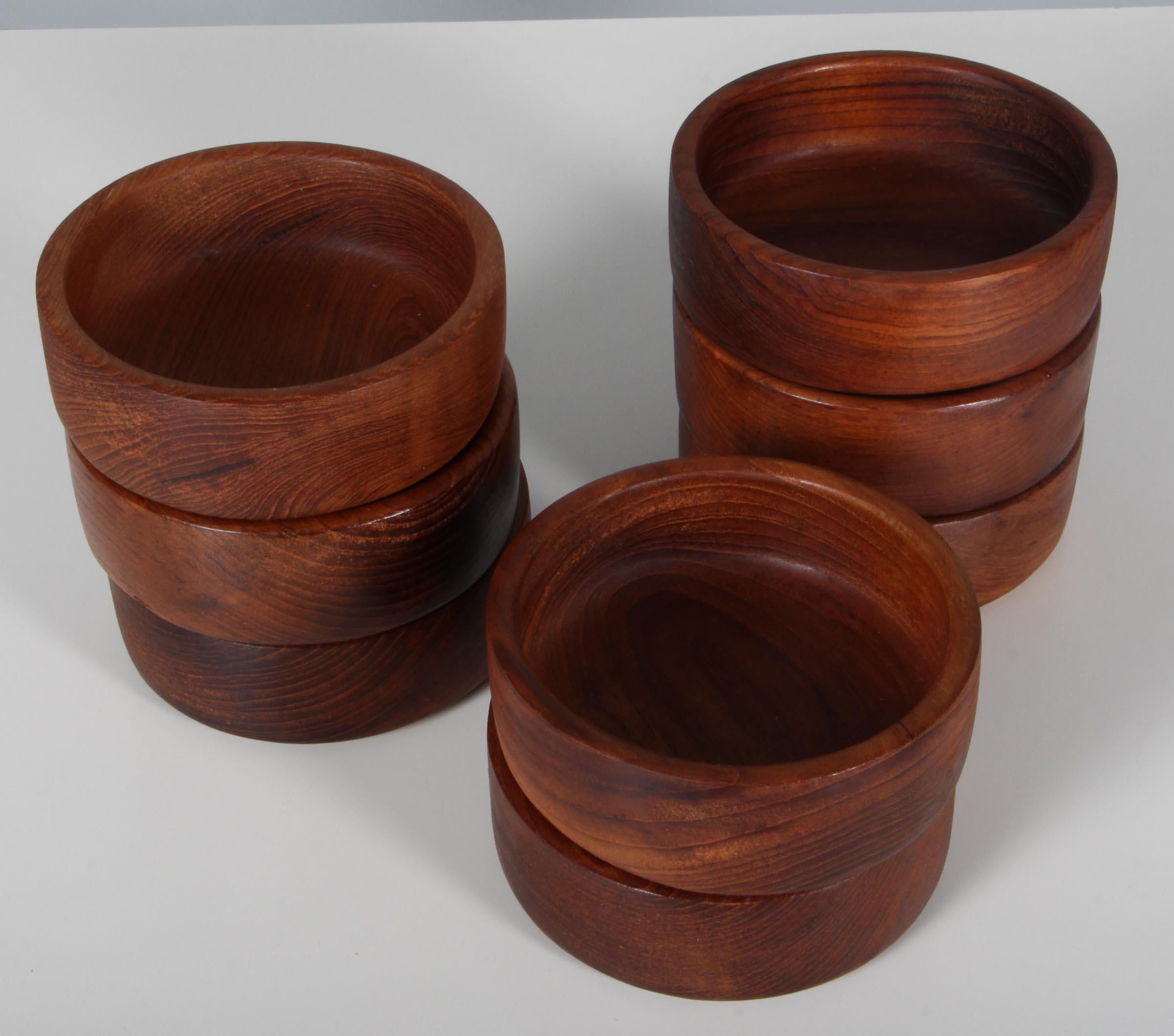 Danish craftmanship, eight teak bowls in solid teak.
 