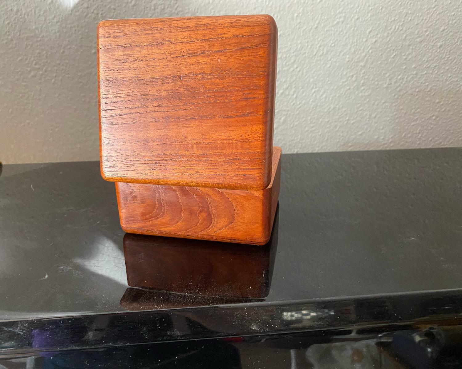 wig sticking out of trunk