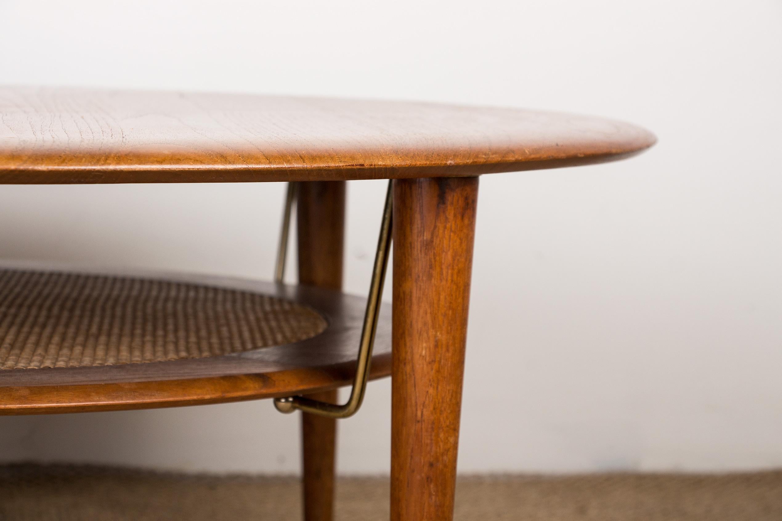 Scandinavian Modern Danish Teak, Brass and Cane FD 515 Round 2-Tier Coffee Table by Peter Hvidt