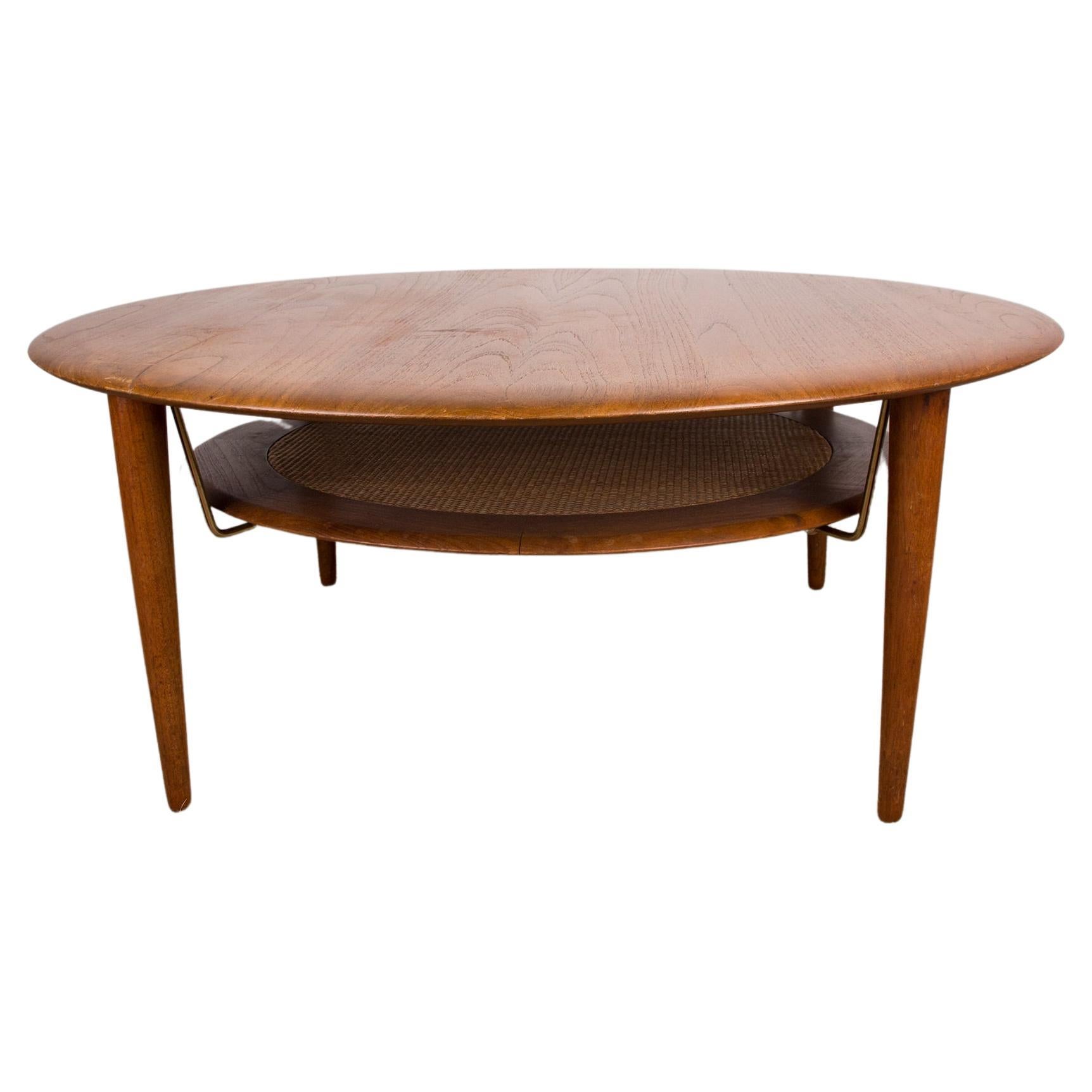 Danish Teak, Brass and Cane FD 515 Round 2-Tier Coffee Table by Peter Hvidt