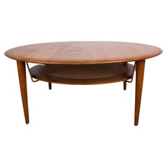 Danish Teak, Brass and Cane FD 515 Round 2-Tier Coffee Table by Peter Hvidt