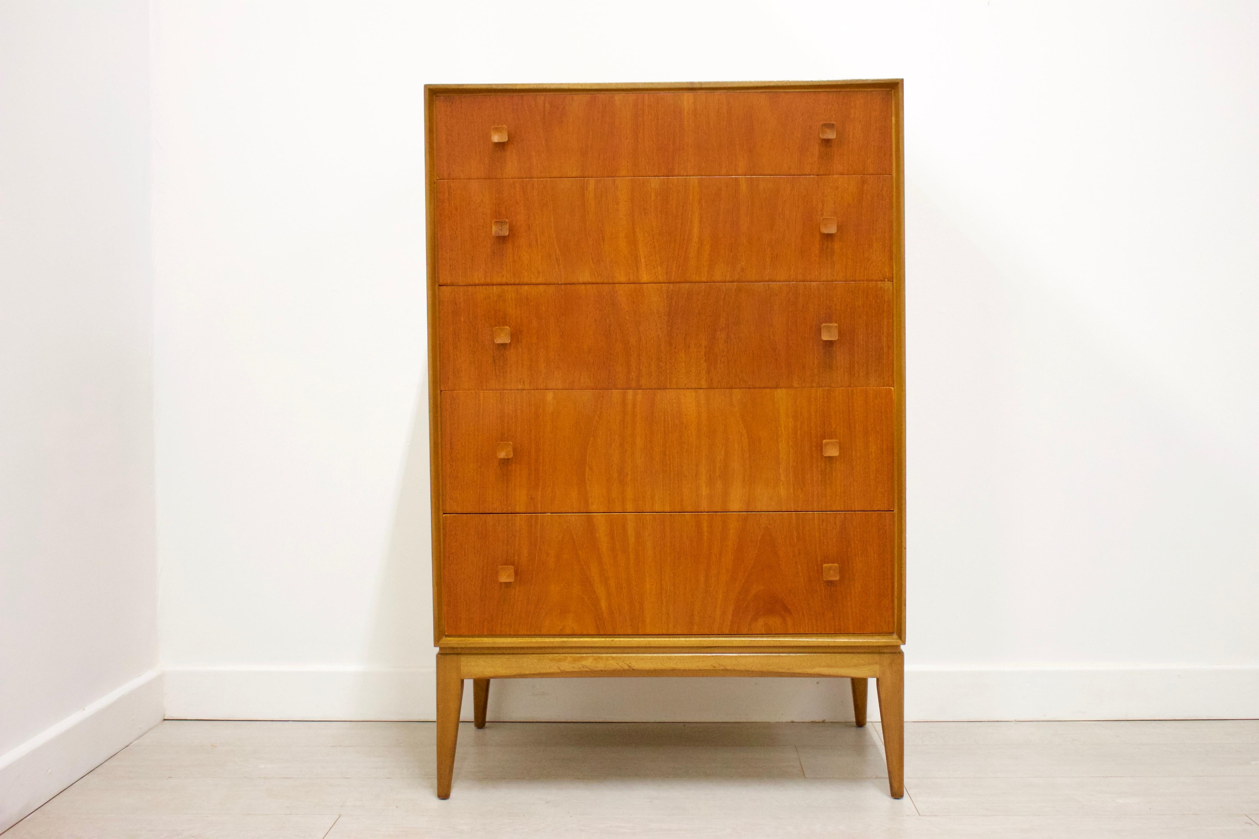 - Midcentury chest of drawers
- Manufactured in the UK by McIntosh
- Made from teak and teak veneer.