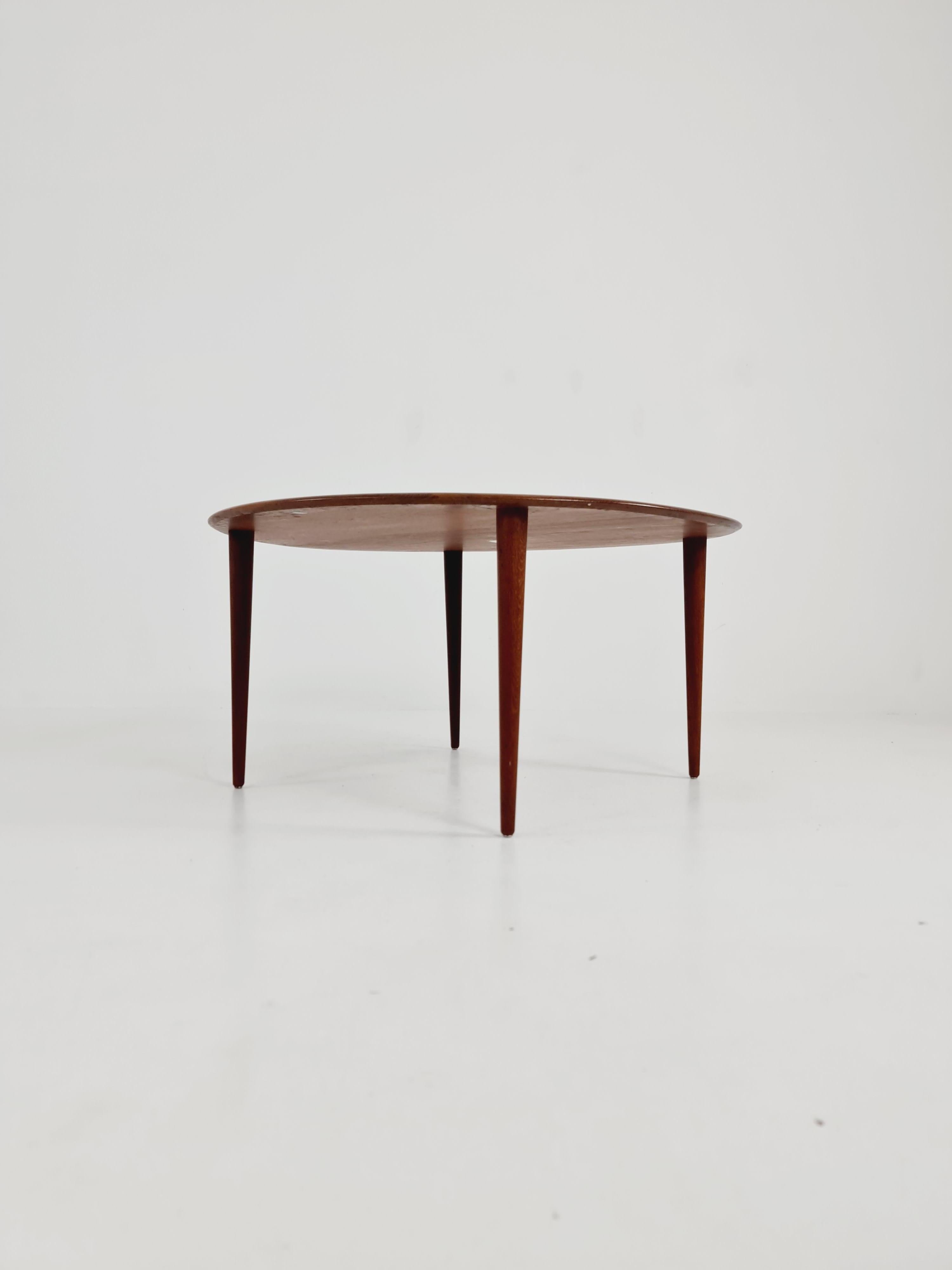 Danish Teak Coffee Table by Peter Hvidt &Orla Mølgaard  for France and søn , 1960s

Design year: 1960s 

Made in Denmark by Peter Hvidt &Orla Mølgaard  for France and søn

Dimensions: : 98  D x 98   B x 48  H cm

It is in great vintage condtion,