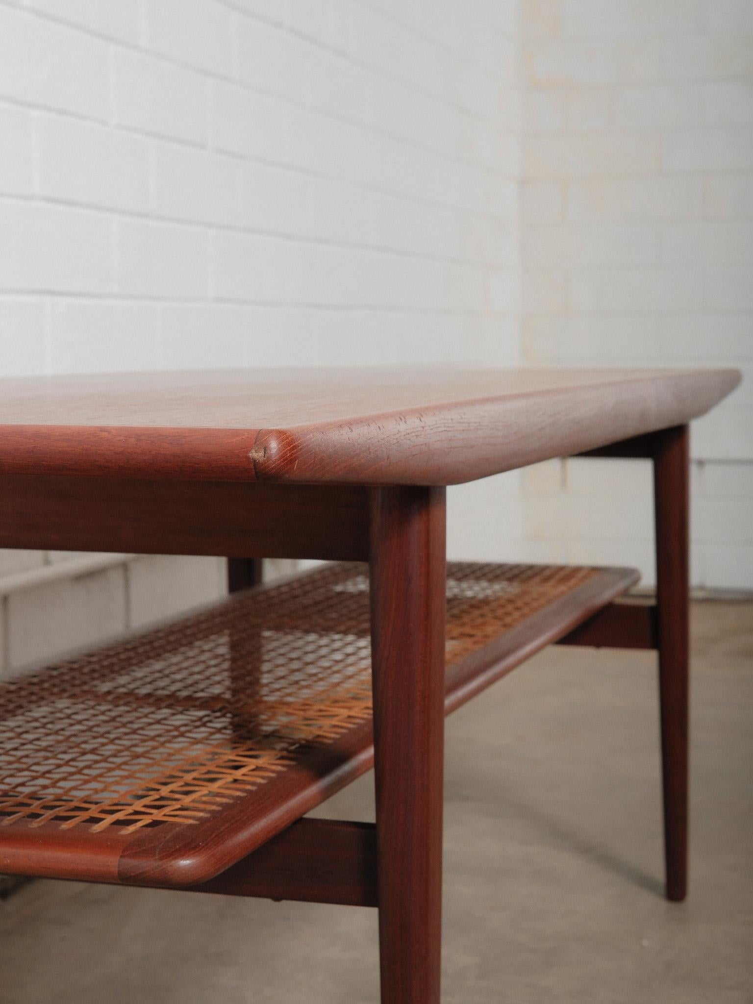 Danish Teak Coffee Table with Cane Shelf by Niels Bach, 1960s For Sale 1