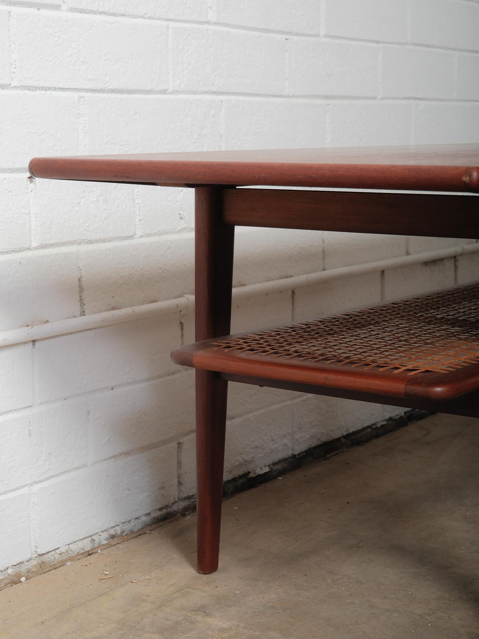 Danish Teak Coffee Table with Cane Shelf by Niels Bach, 1960s For Sale 2