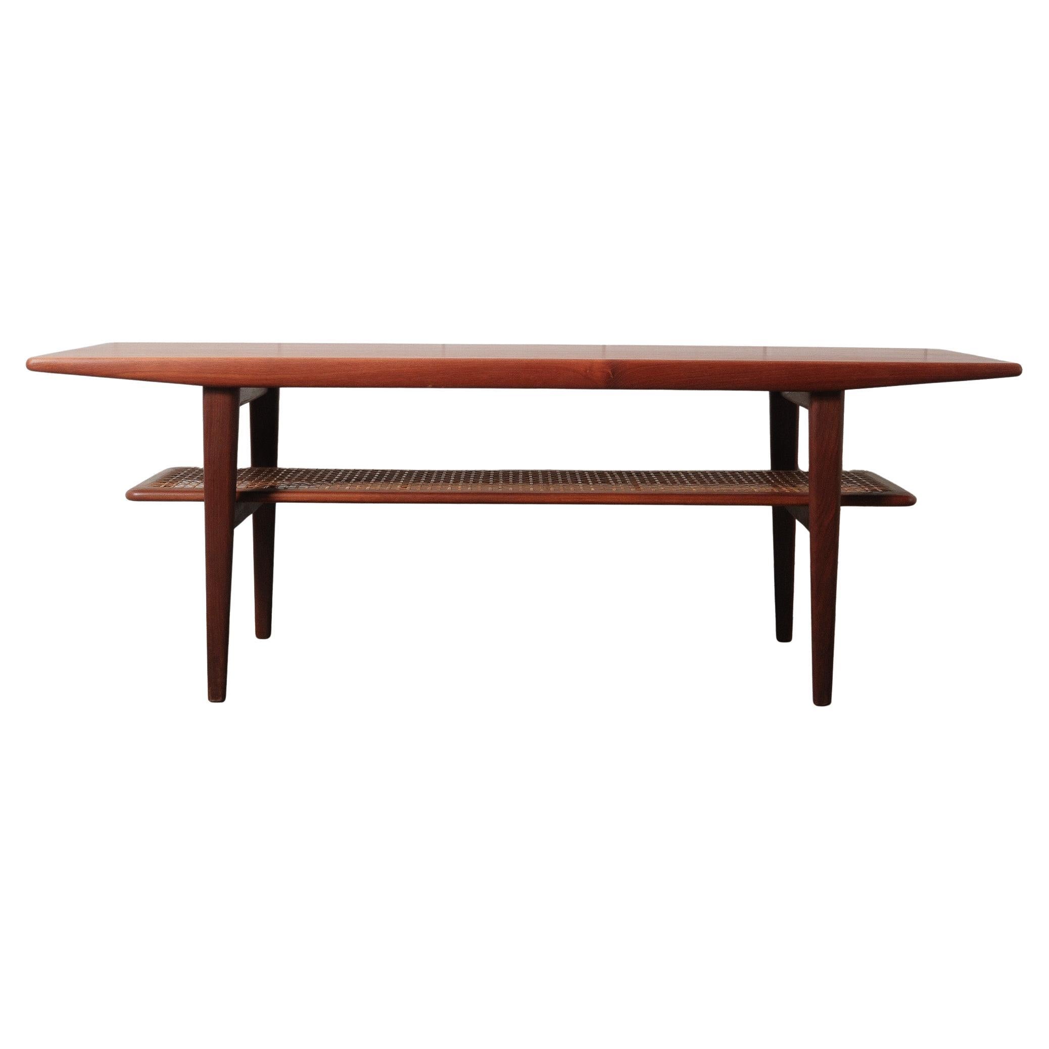 Danish Teak Coffee Table with Cane Shelf by Niels Bach, 1960s For Sale