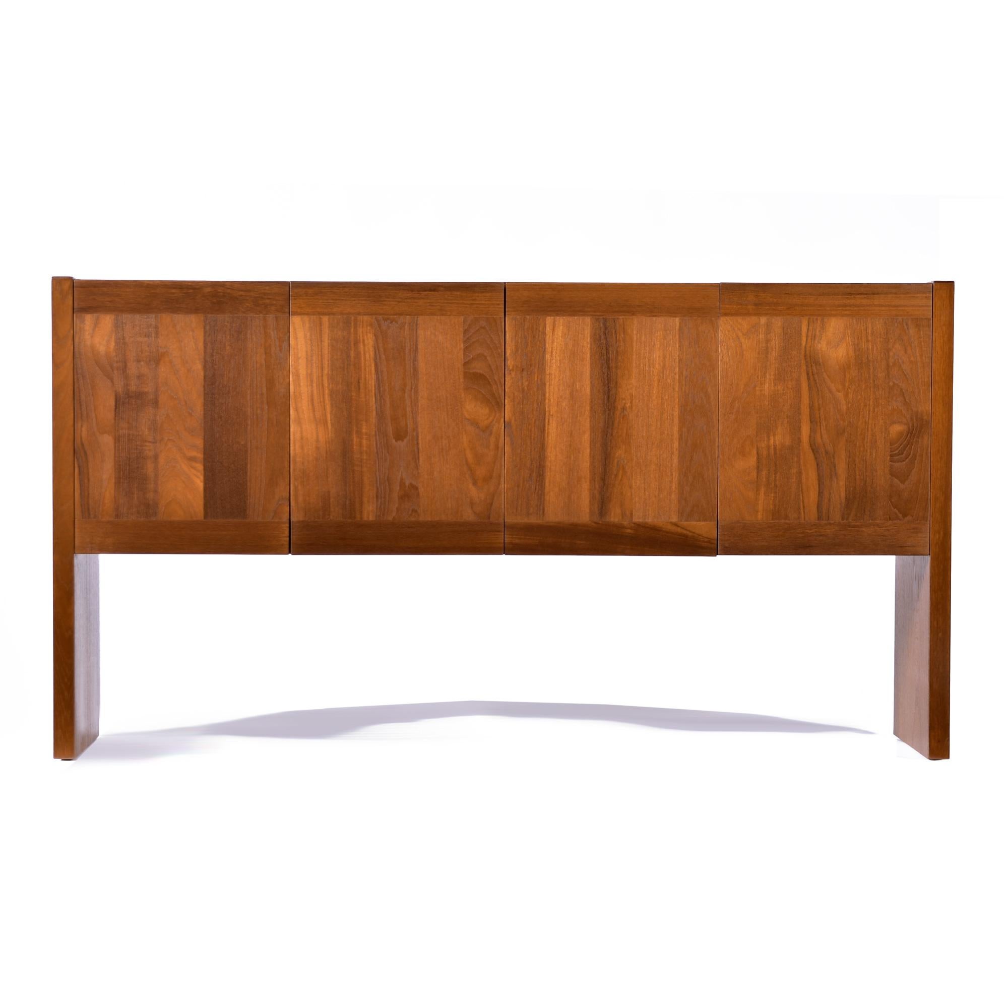 Exquisitely crafted vintage 1970s Danish teak credenza by Dyrlund. This is the perfect media center. The large cabinet spaces provide amble room for 12 inch LP records and components. Mount your flat screen above or place on the top with a stand. 