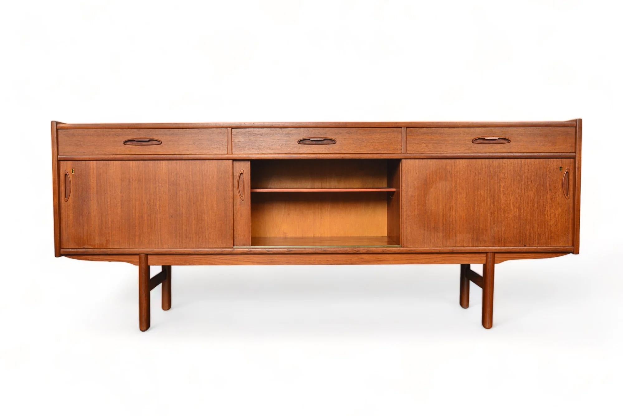 Danish Teak Credenza With Sliding And Locking Doors In Good Condition For Sale In Berkeley, CA