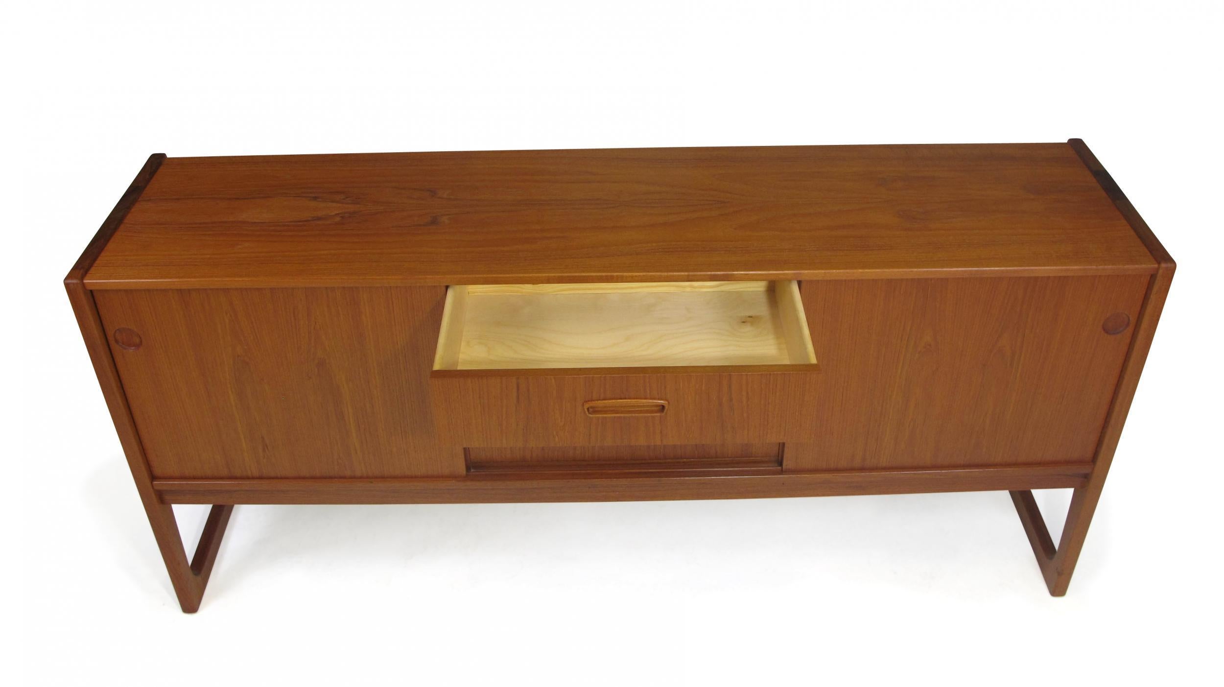 Danish Teak Credenza with Sliding Doors and Drawers In Excellent Condition In Oakland, CA