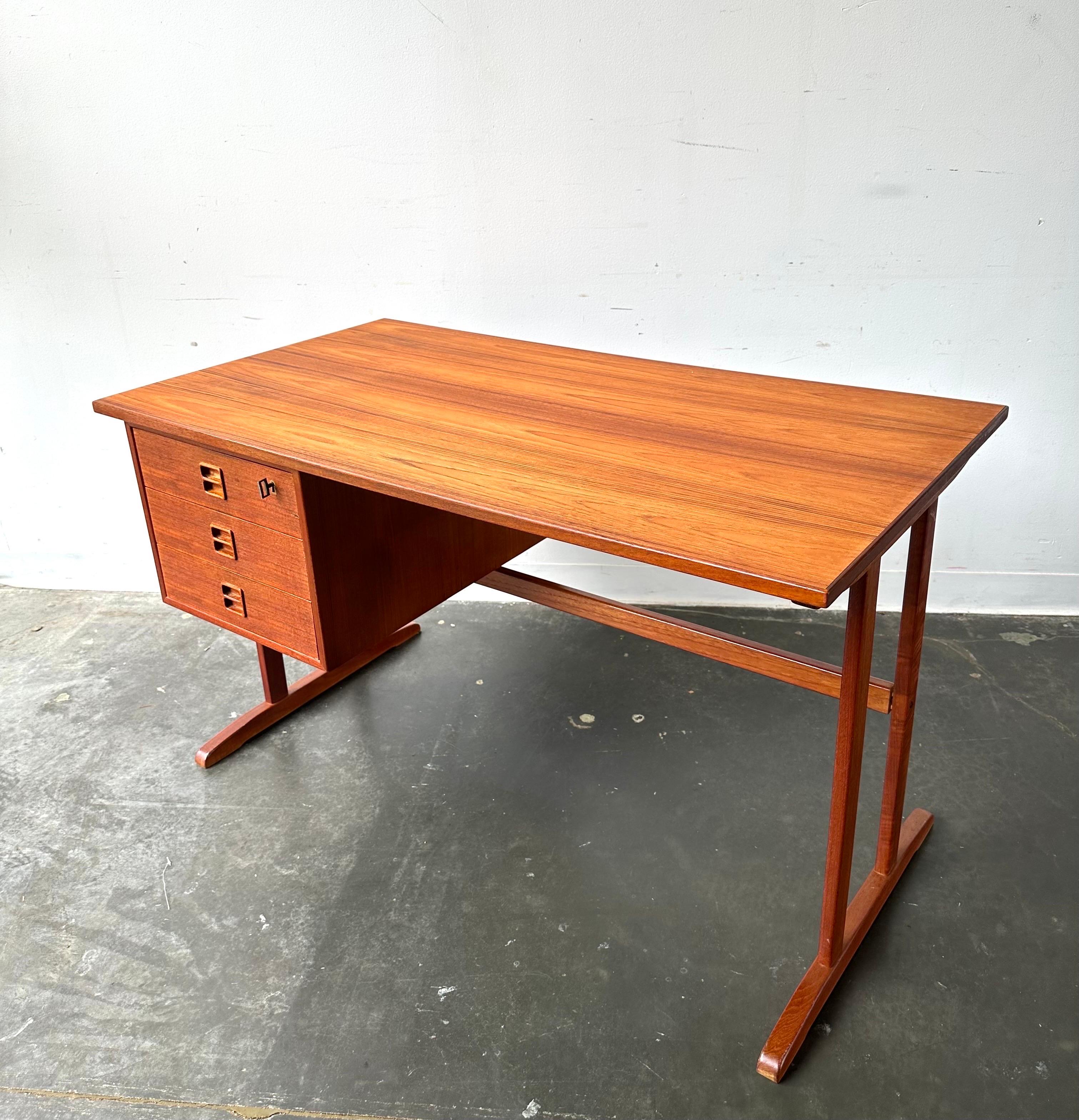 Mid-Century Modern Danish teak desk with open bookcase back in the style of Arne Vodder 