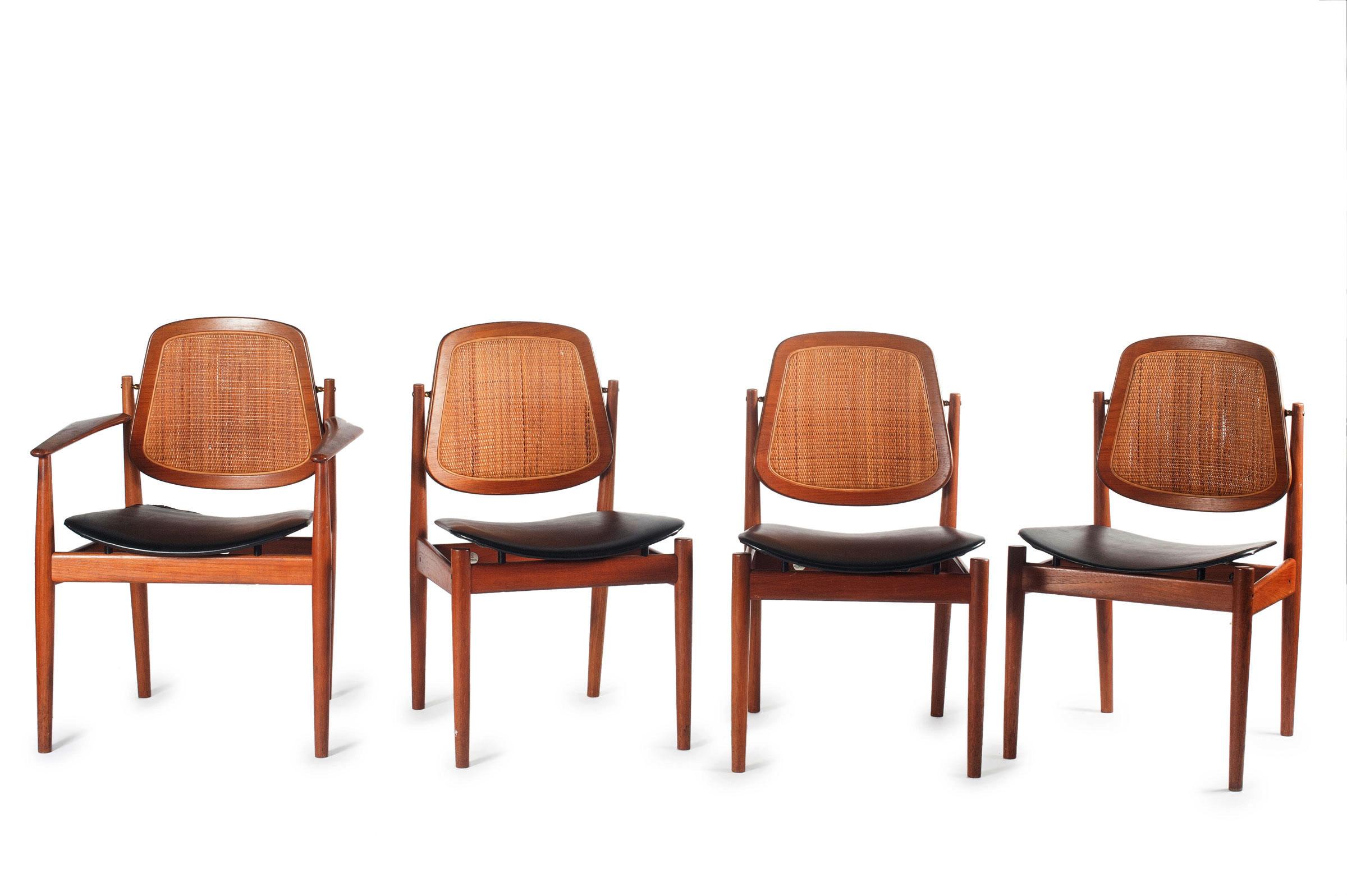 A rare set of eight dining chairs model 205 & 206 designed by Arne Vodder. Produced by France & Daverkosen in Denmark, during the 1950s. Crafted in a solid teak wooden frame, with a flexible back rest in seagrass. The original upholstery in black