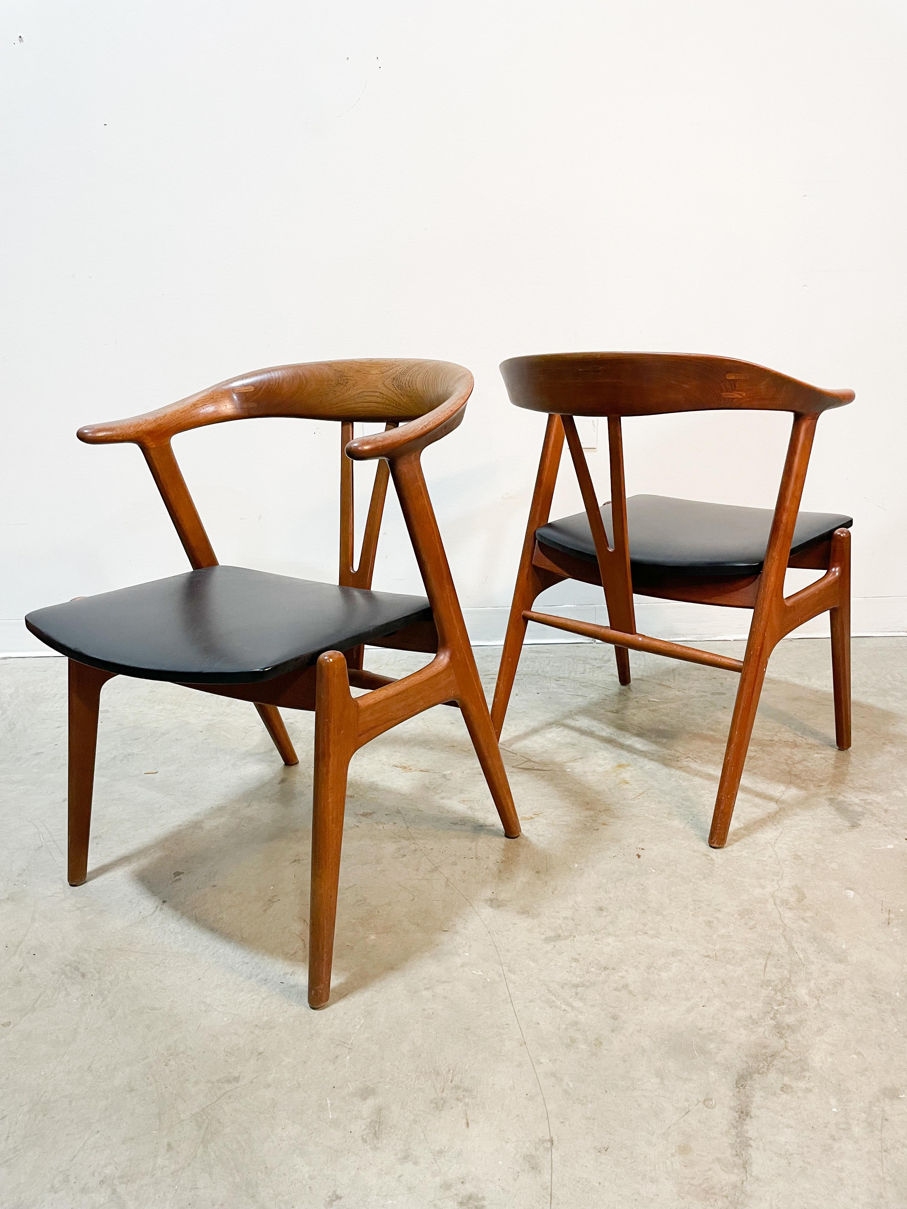 Superb teak dining chairs designed by Norwegian Tobjorn Afdal. Extremely comfortable with striking design elements - almost a hybrid of Hans Wegner's Wishbone and Round chairs. Very well made with distinctive inlays on the seat back joints. The