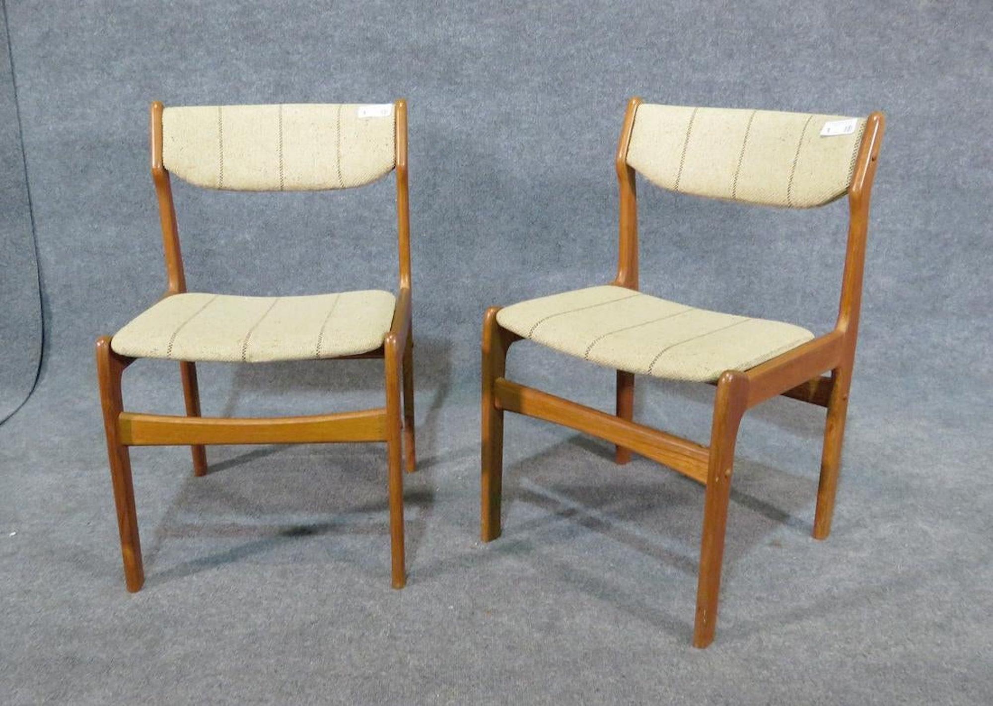 Erik Buch style teak dining chairs. Upholstered seat and back.
(Please confirm item location - NY or NJ - with dealer).
        