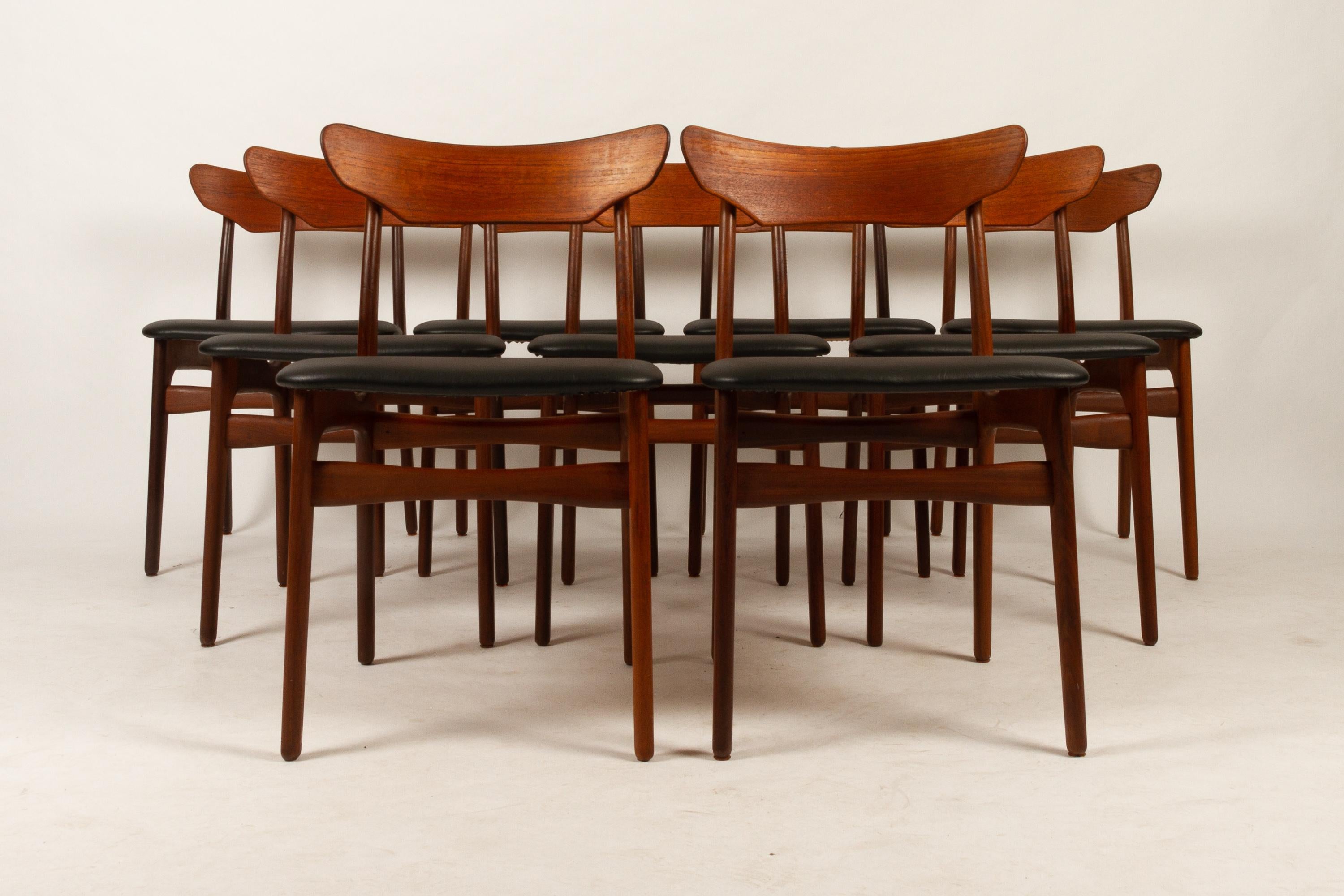 Beautiful set of nine Mid-Century Modern teak dining chairs. Sculpted backrests and a solid teak frame. Restored and reupholstered for maximum comfort, ready to enjoy. A Classic Danish modern chair.