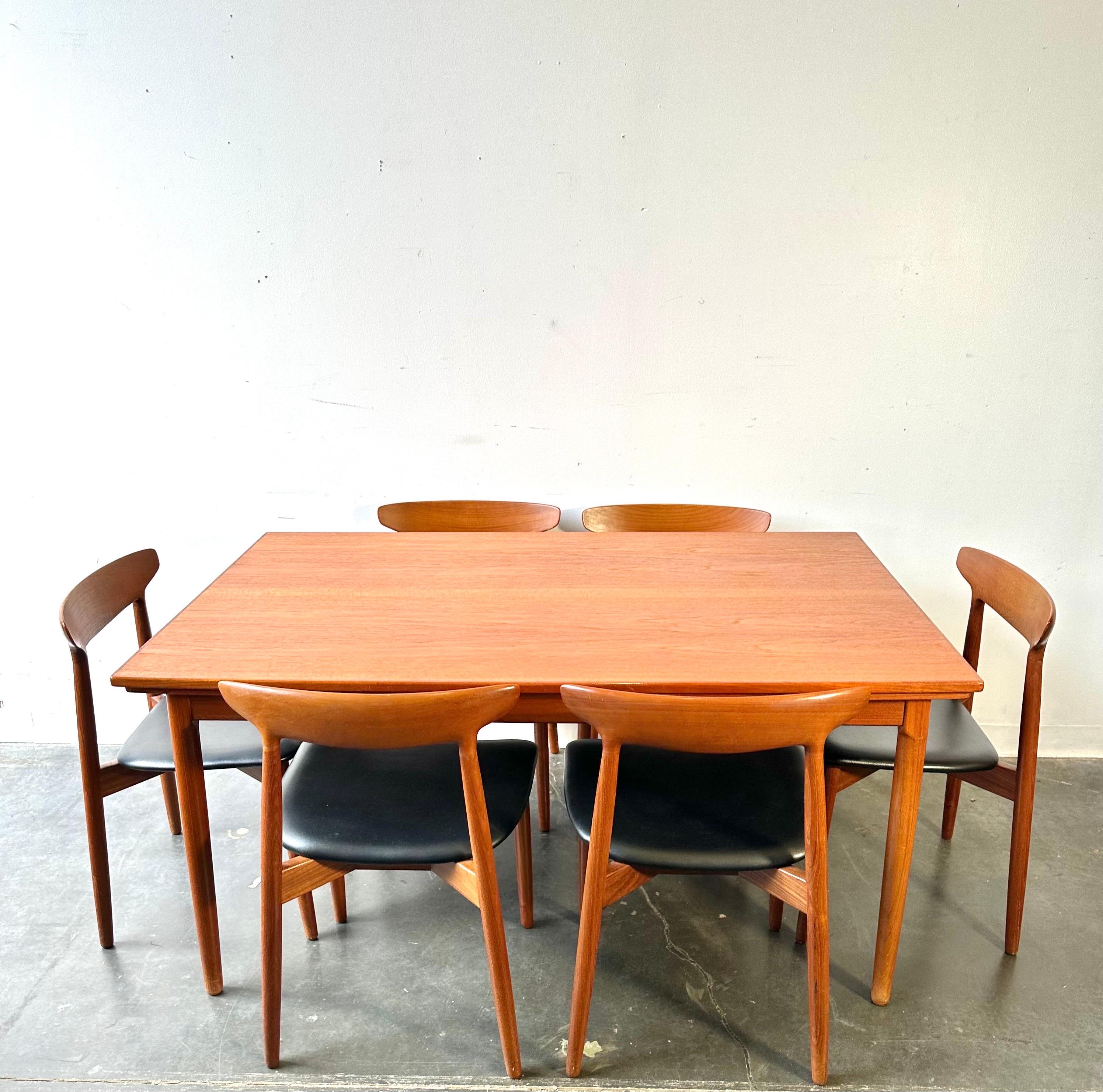Danish teak dining table and chairs by Harry Ostergaard for Randers Mobelfabrik

Fantastic Scandinavian expandable table with six chairs.
This set is in great condition with very minor wear,

Measures: 57 1/2” W
35 3/4” D
28 1/2” H

21” x 2