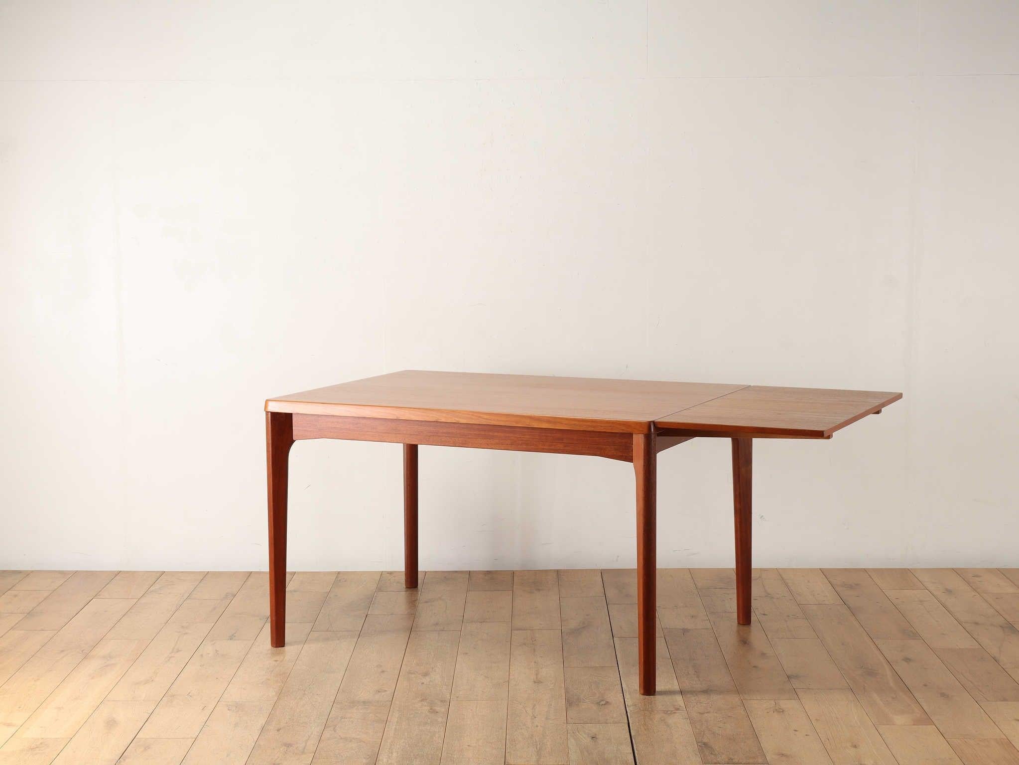 Mid-Century Modern Danish Teak Draw Leaf Dining Table by Henning Kjærnulf