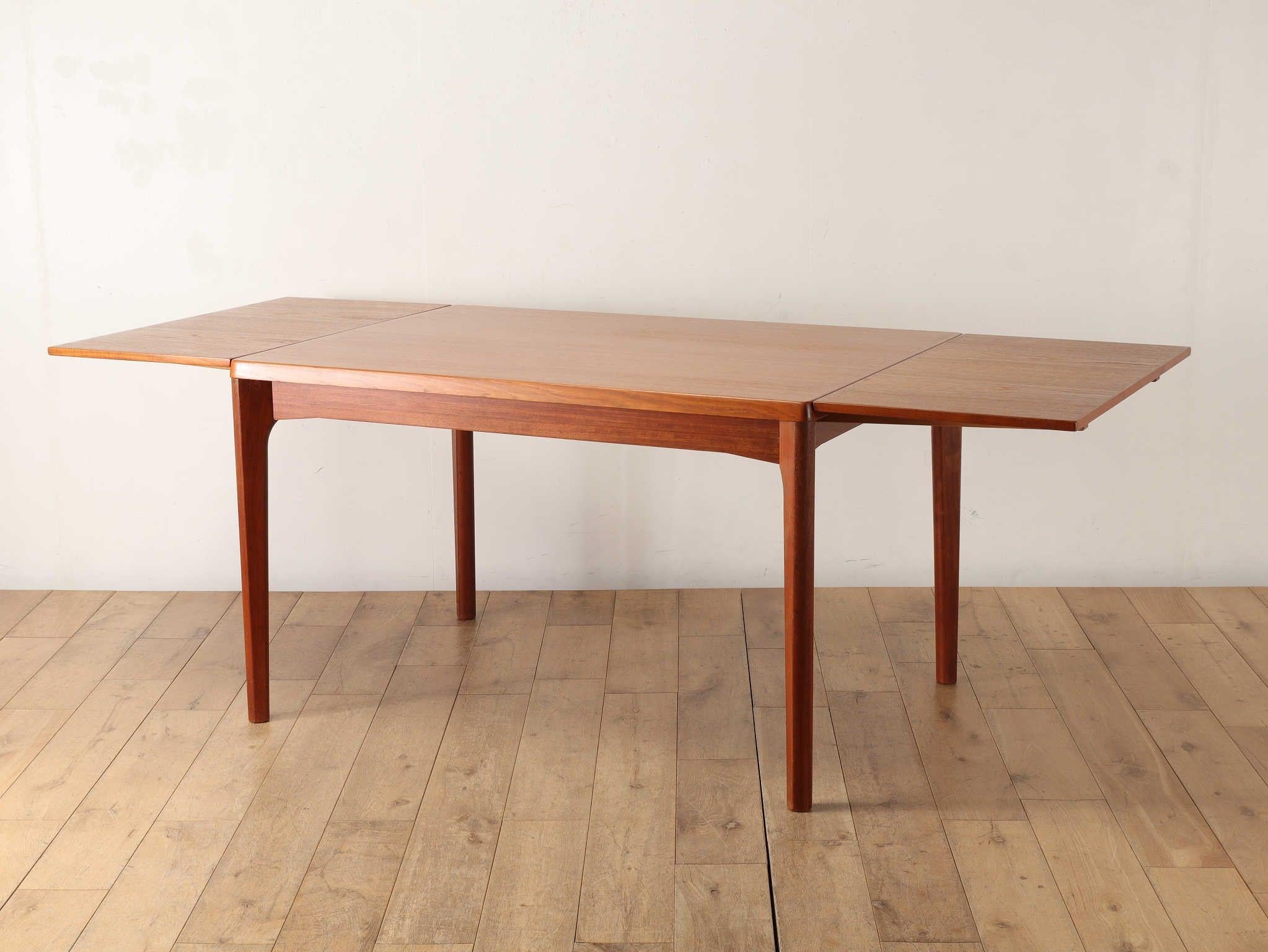Mid-20th Century Danish Teak Draw Leaf Dining Table by Henning Kjærnulf