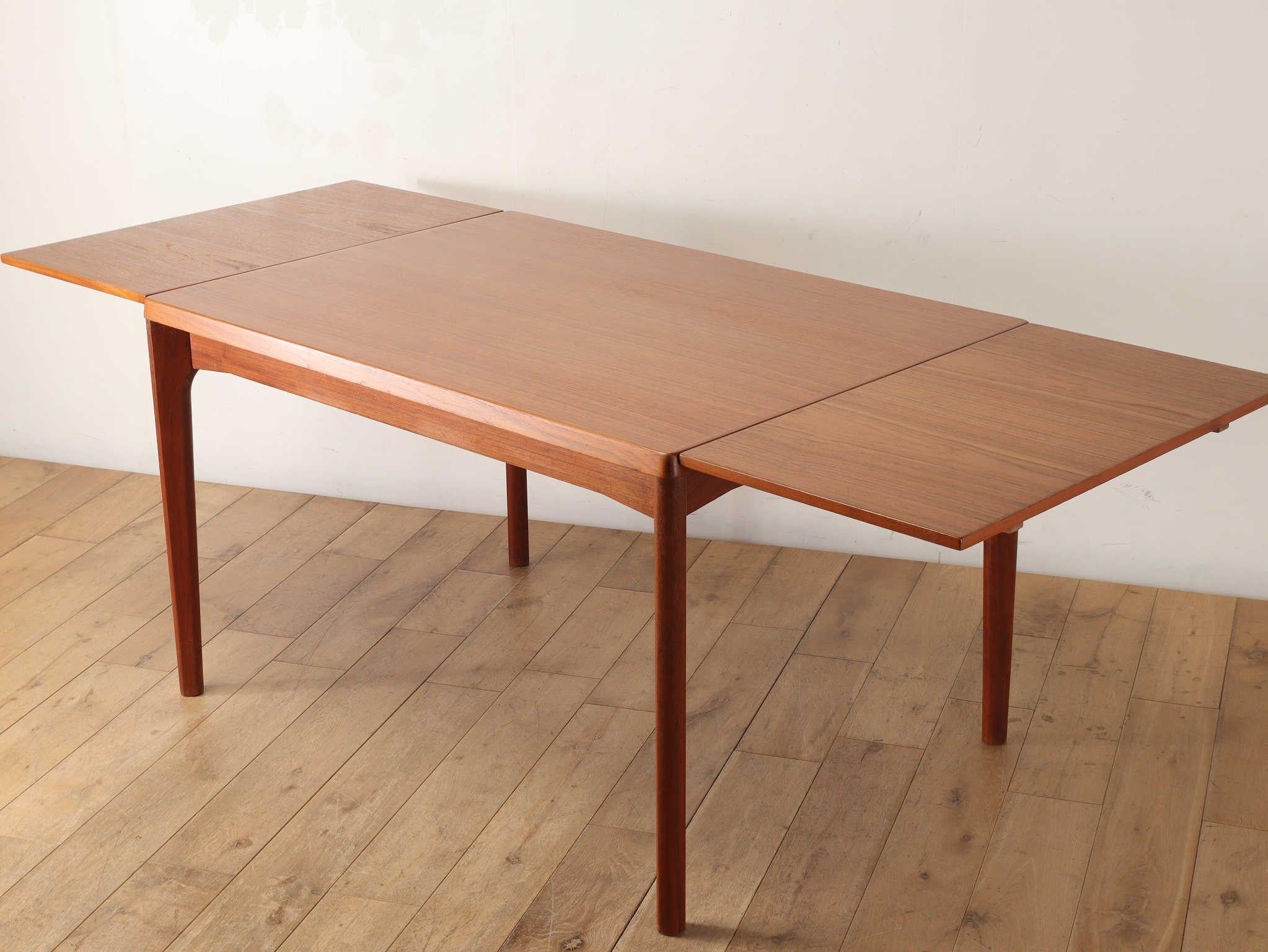 Danish Teak Draw Leaf Dining Table by Henning Kjærnulf 1