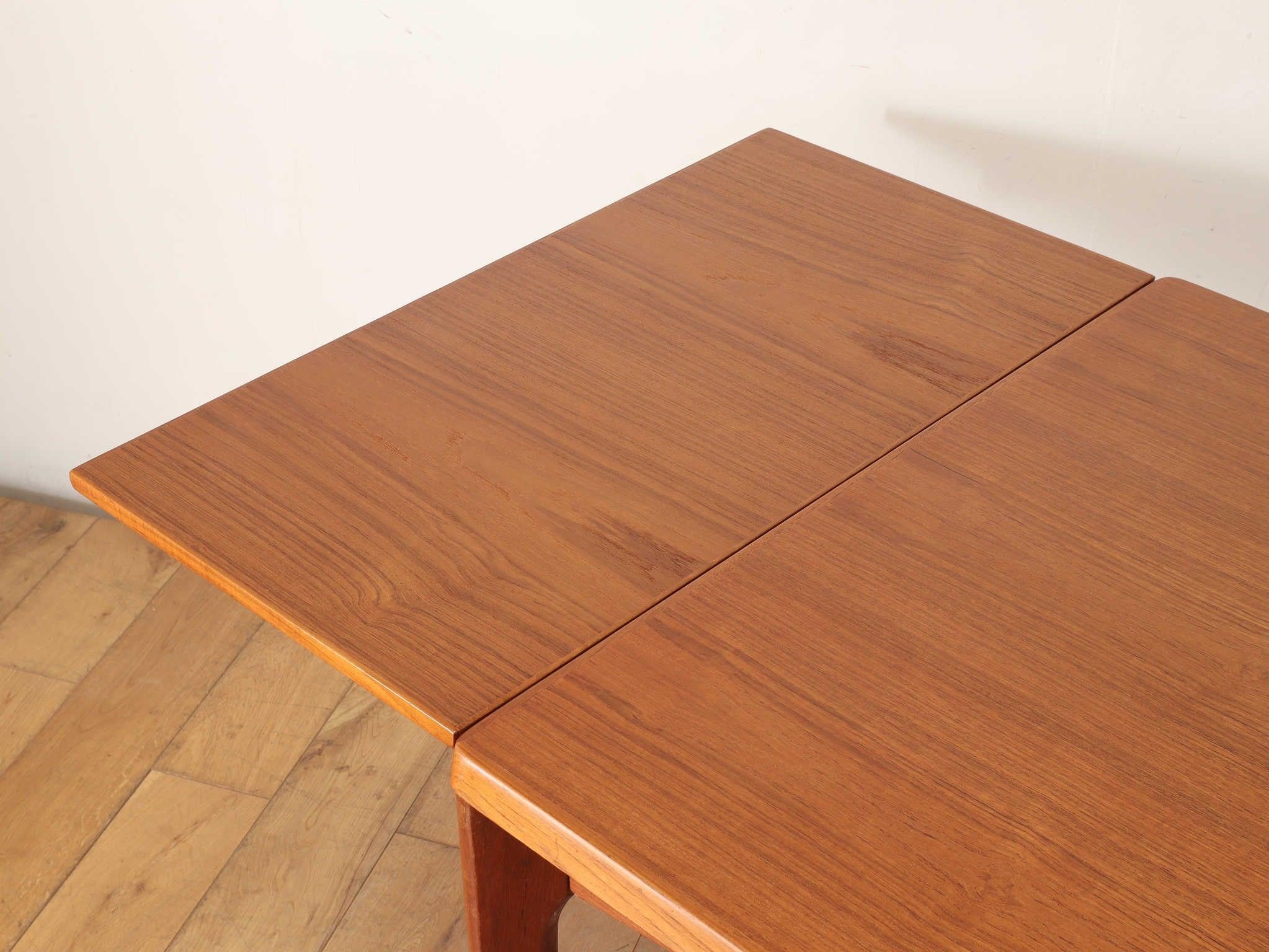 Danish Teak Draw Leaf Dining Table by Henning Kjærnulf 2