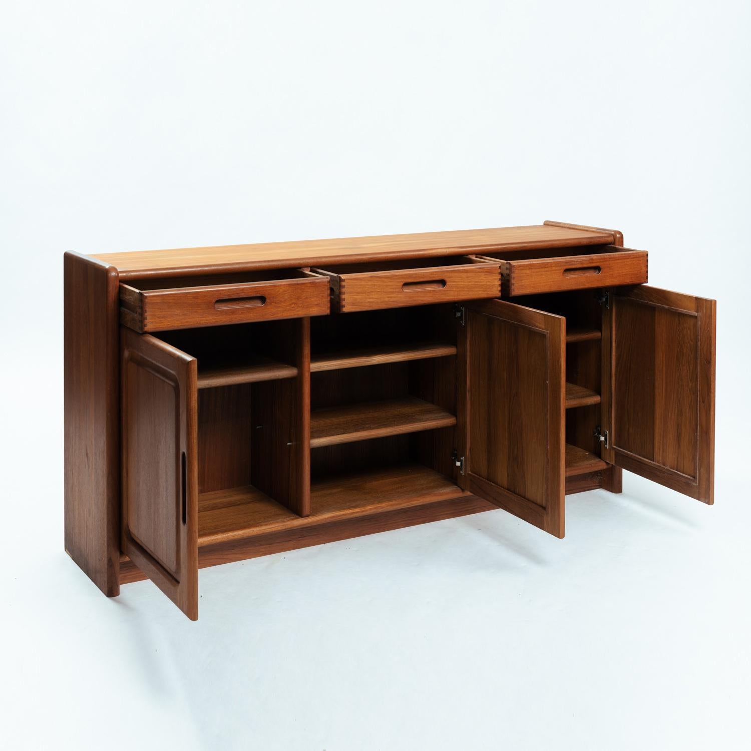 Woodwork Danish teak Dyrlund credenza sideboard with visible joints, drawers and doors For Sale
