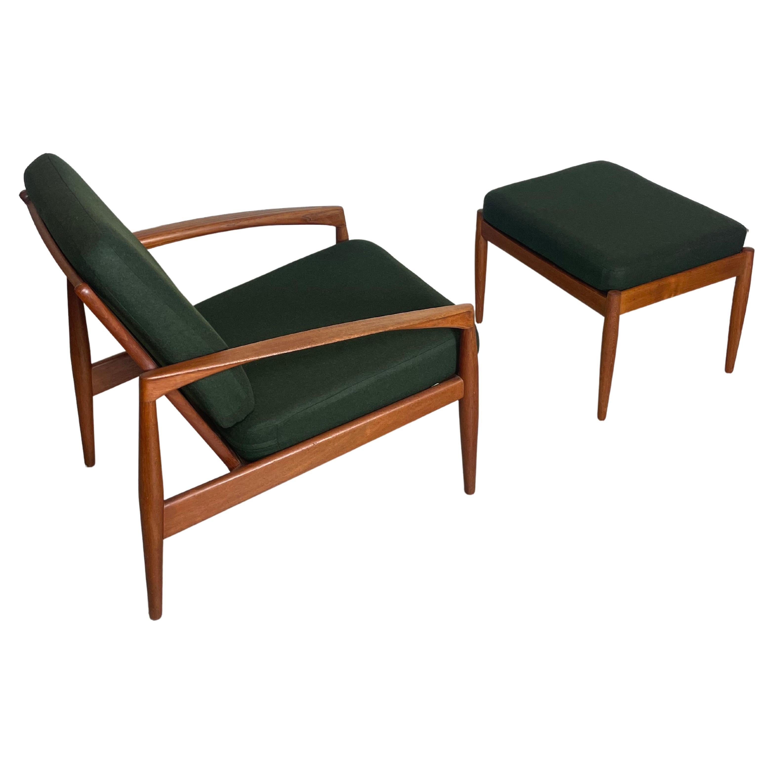 Mid-century easy chair designed by Kai Kristiansen. This model Paper Knife features a maching foot stool (ottoman) which can be also used as a beside table.
This is a set made of solid teak wood, we have restored it completely, with new new