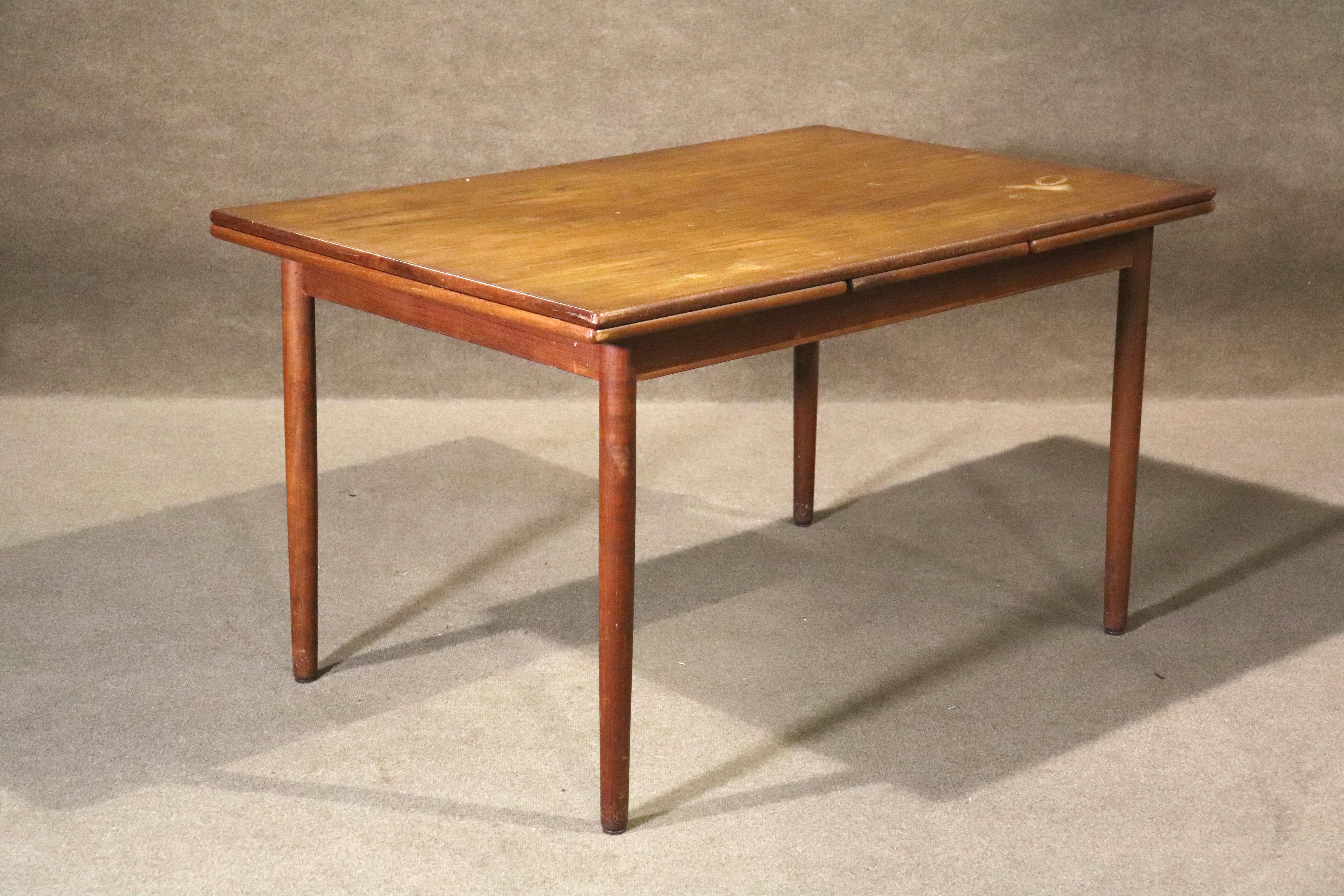Danish made dining table with two 18