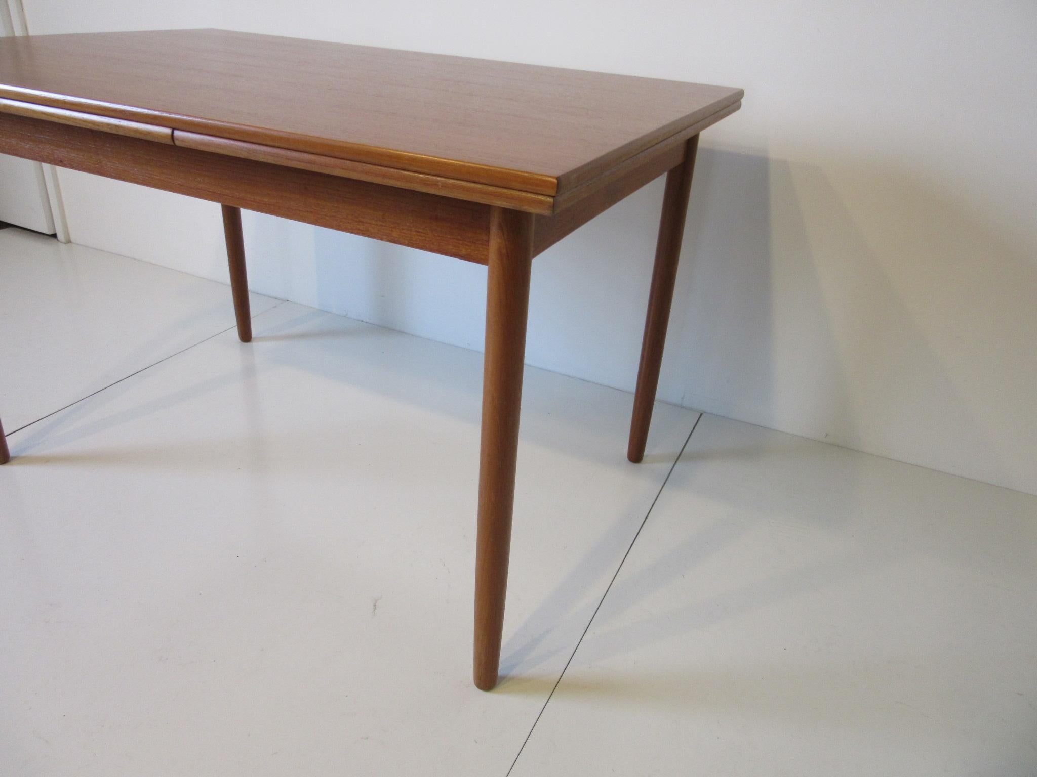 Mid-Century Modern Danish Teak Extension Dining Table by L & F Mobler