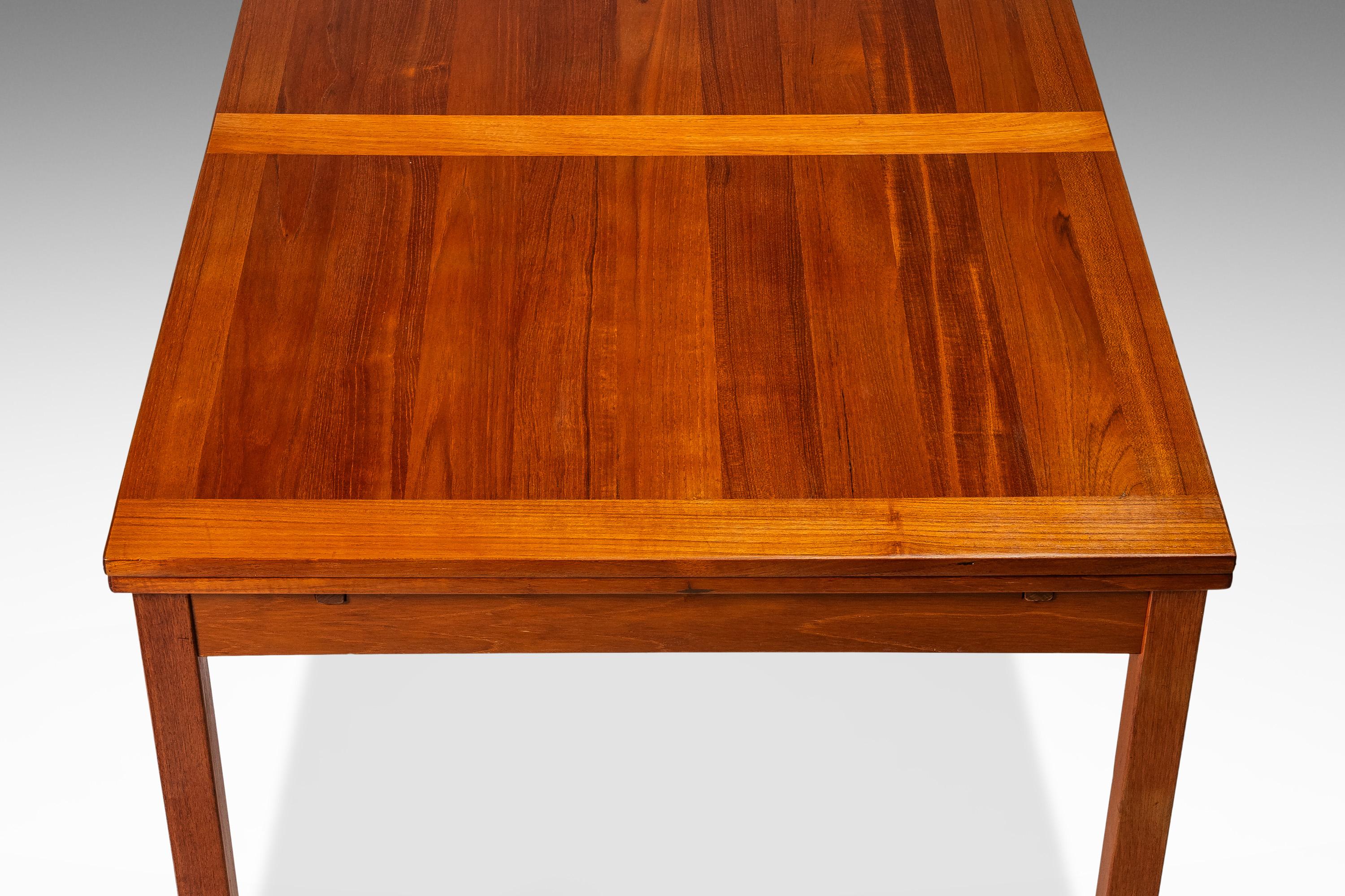 Danish Teak Extension Dining Table with Stow-in-Table Leaves, Denmark, c. 1970s 5