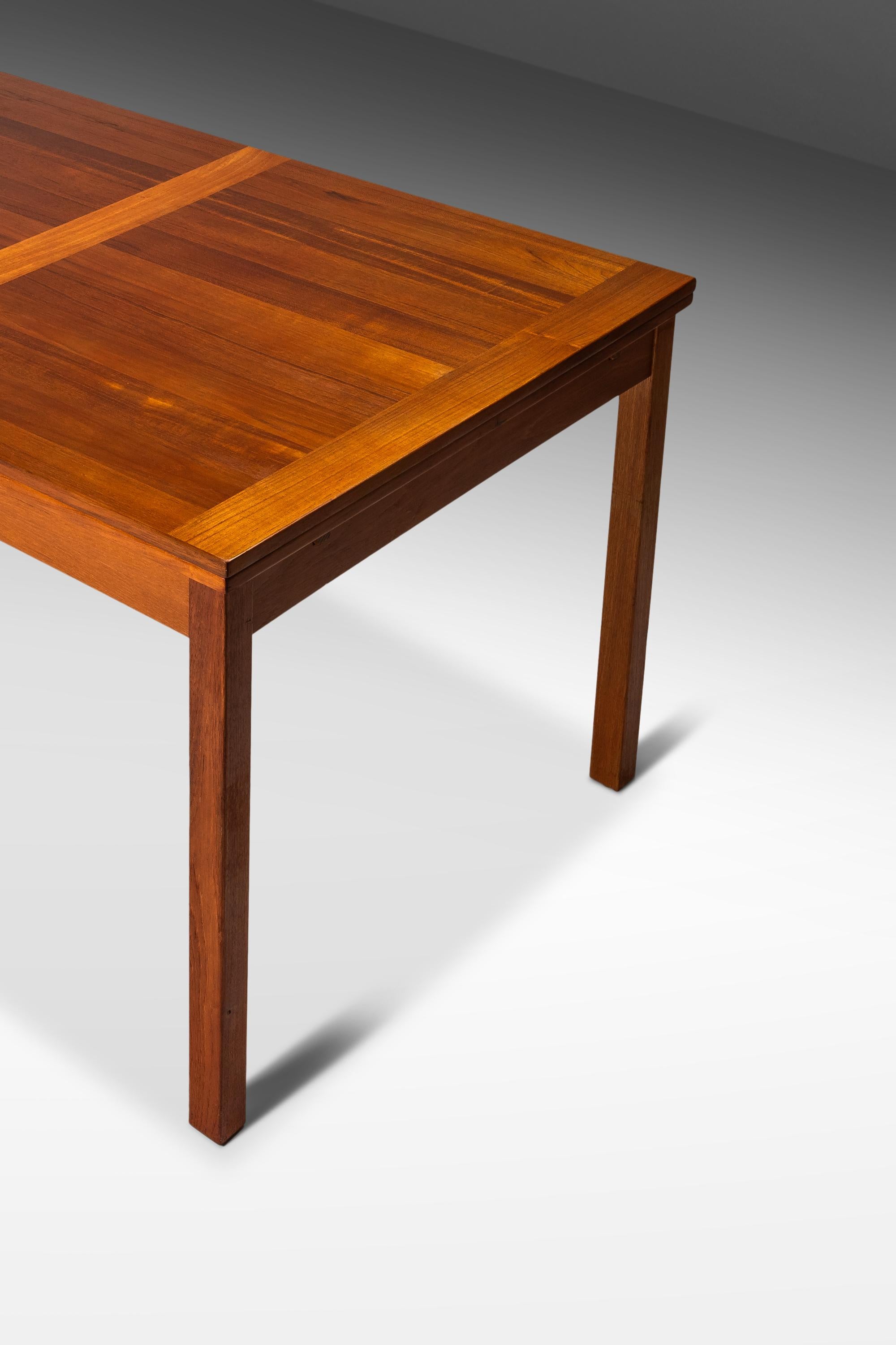 Danish Teak Extension Dining Table with Stow-in-Table Leaves, Denmark, c. 1970s 9