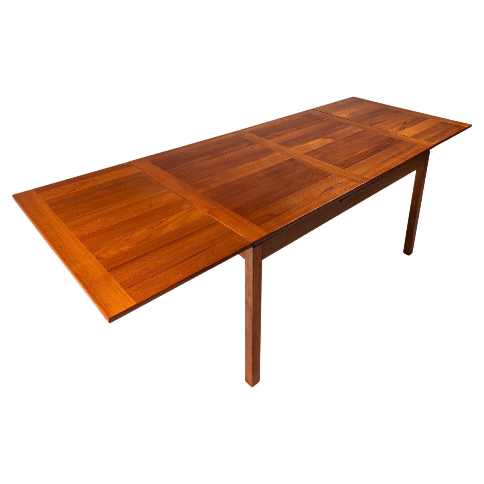 Danish Teak Extension Dining Table with Stow-in-Table Leaves, Denmark, c. 1970s For Sale