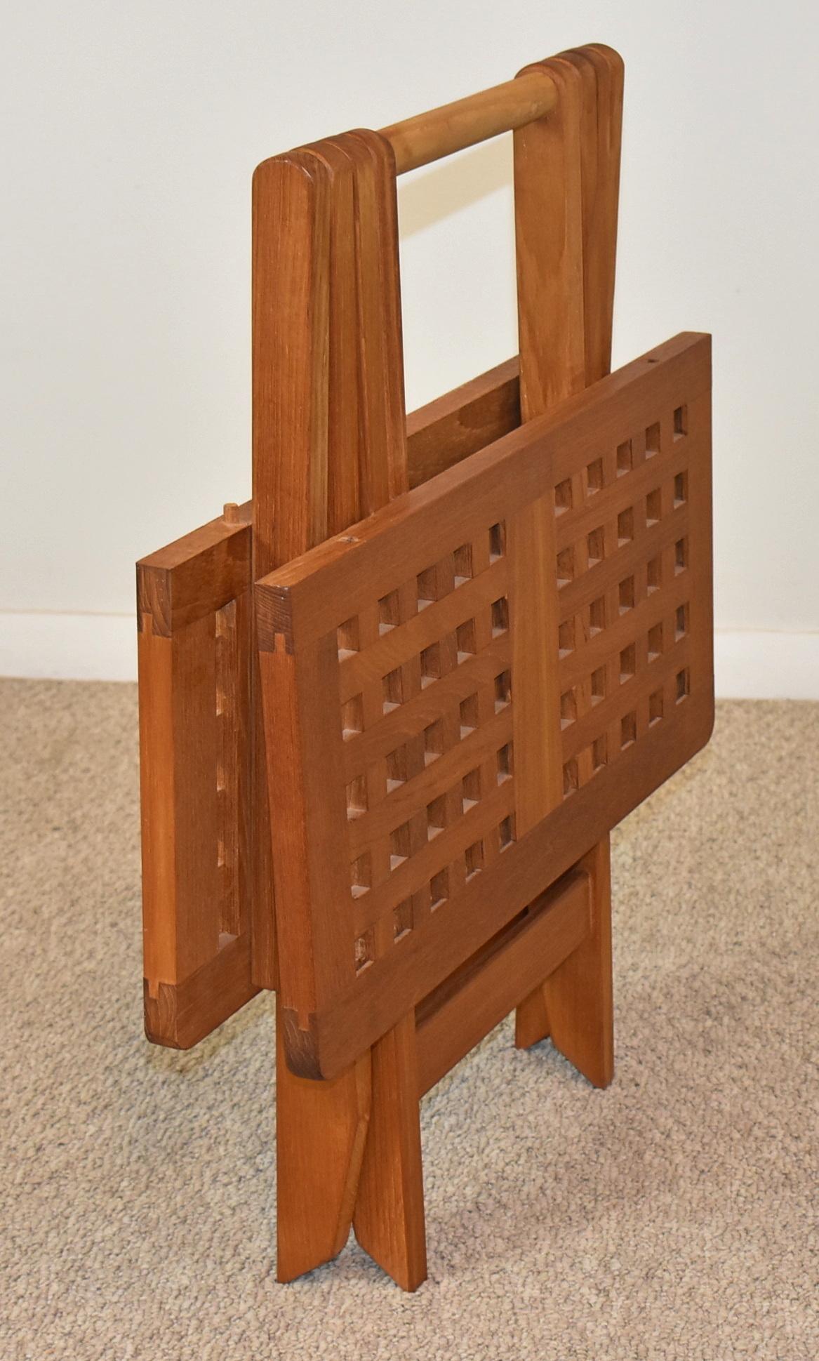 Danish teak folding table by Skagerak, circa 1970s. Skagerak Denmark (Danish, established in 1976). Fold up table with checkerboard open top. Markers tag on bottom. Excellent condition. Dimensions: 21