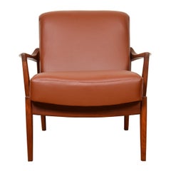Fauteuil de salon danois à cadre en teck et coussins en cuir par Tove & Edvard Kindt-Larsen