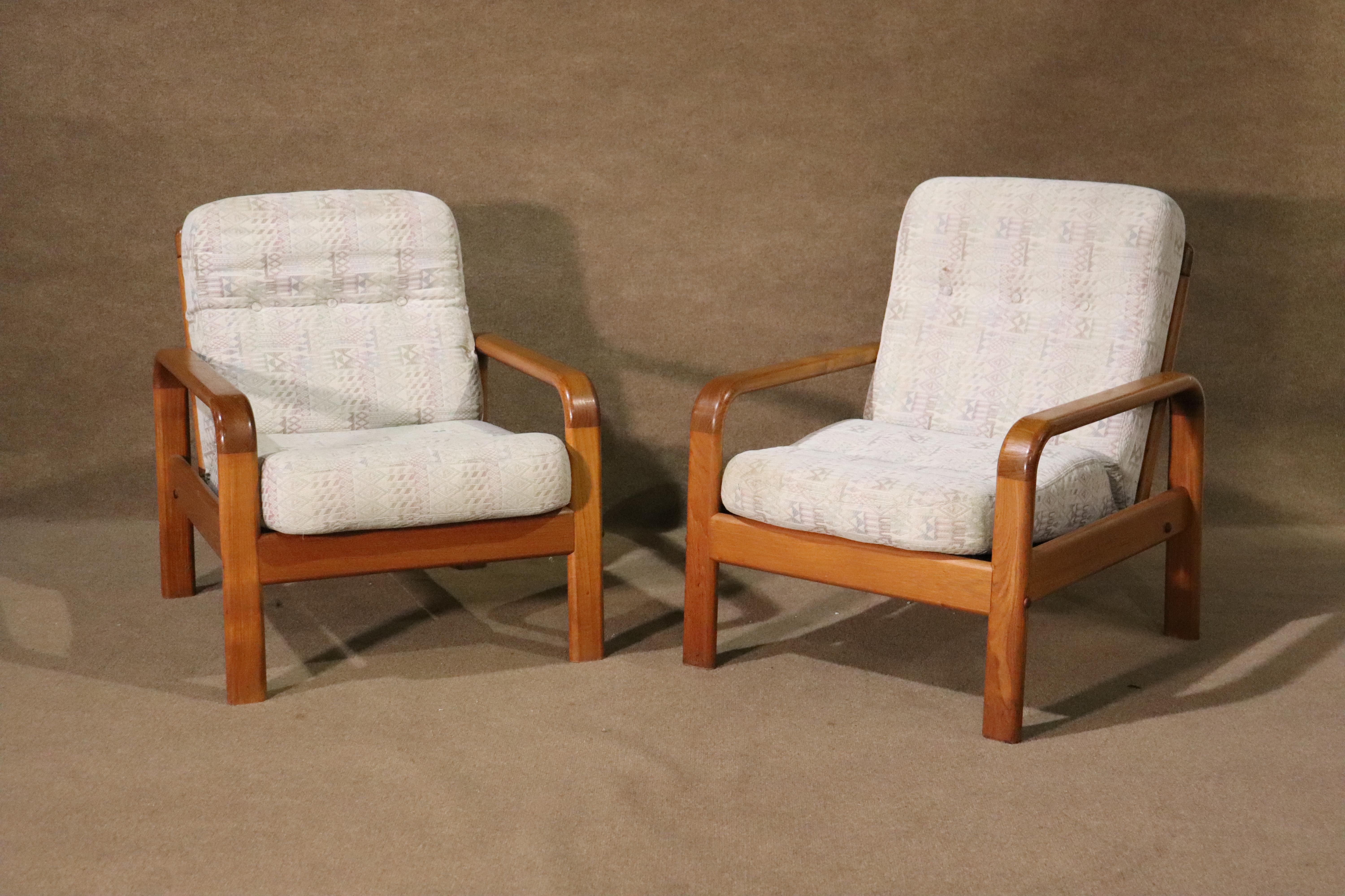 Pair of mid-century Danish made lounge chairs in teak wood. Bentwood arms and thick slat backs.
Please confirm location NY or NJ