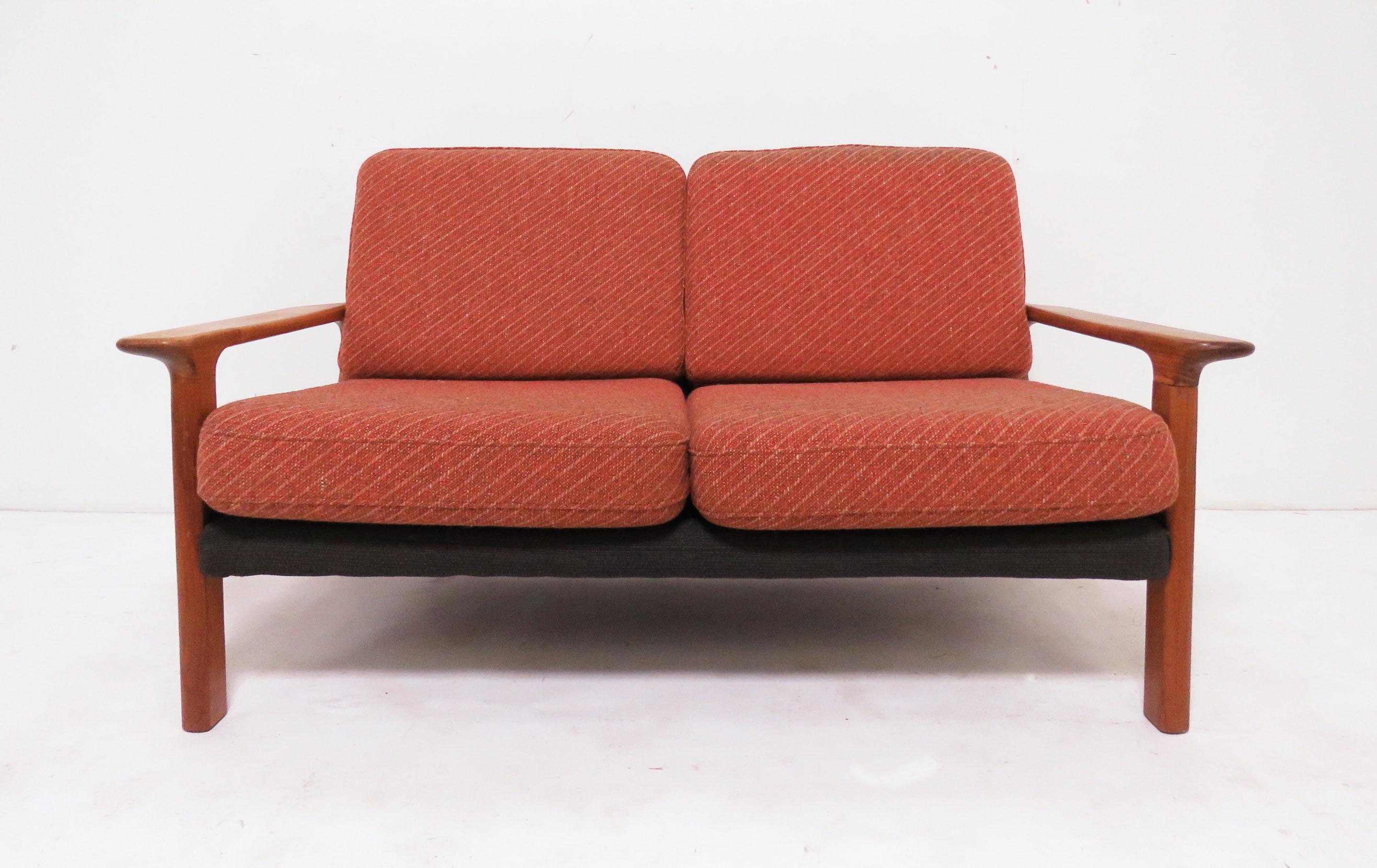 Teak Mid-Century Modern loveseat paddle arm sofa with two-tone upholstery, circa 1970s. Unknown maker.