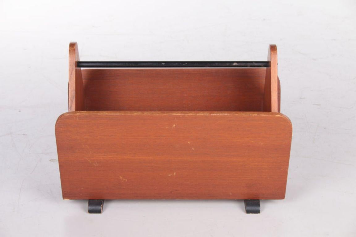 Danish Teak Magazine Rack, 1960s

Additional information:
Dimensions: 45 W x 23 D x 34 H cm
Period of Time: 1960
Country of origin: Denmark
Condition: Good