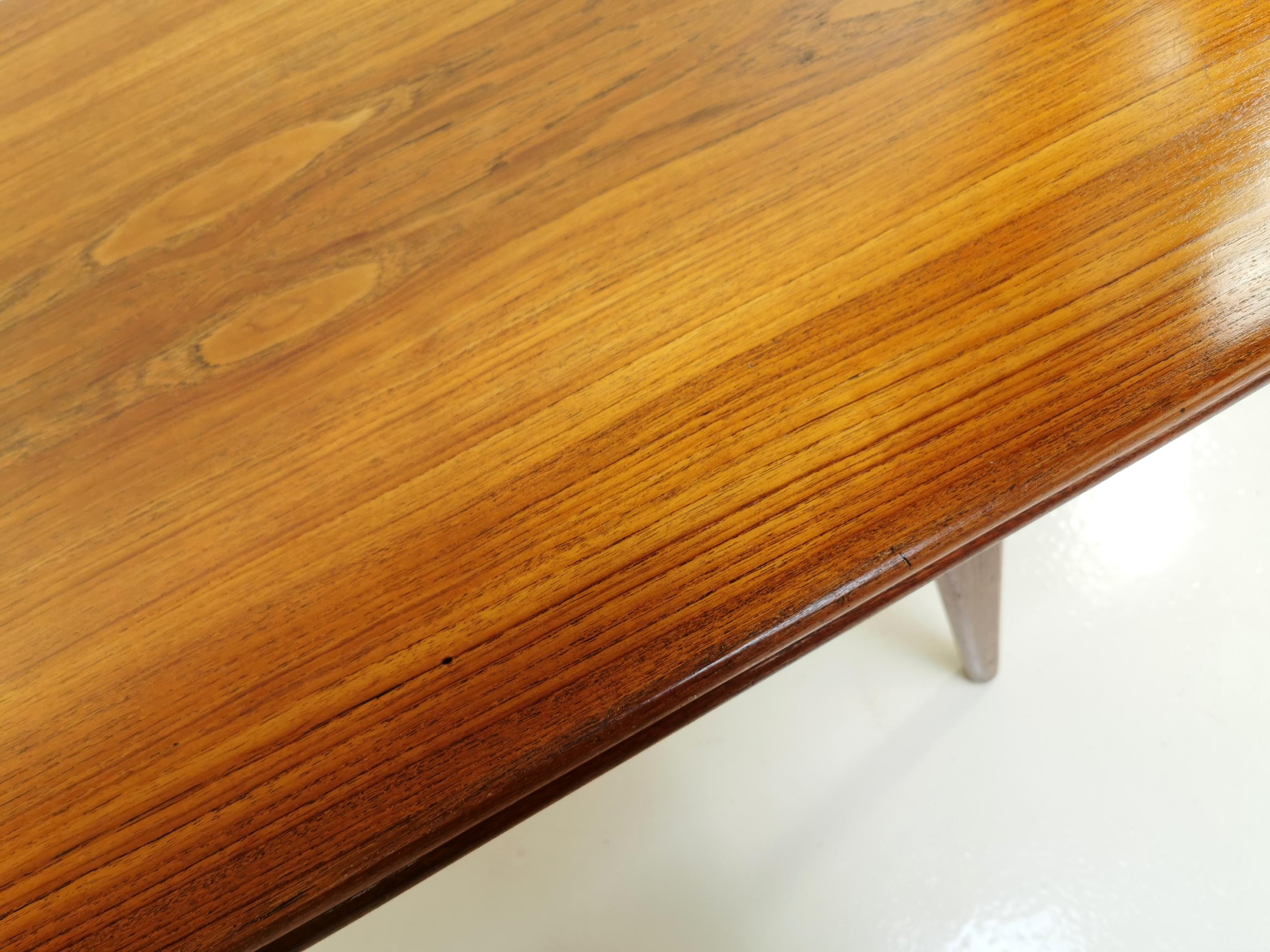 About this item
Metamorphic teak dining table from the 1960s. Splayed legs with detailed joints make this much more desirable than others currently on the market.

Know as the elevator table, and the innovative design sees the coffee table