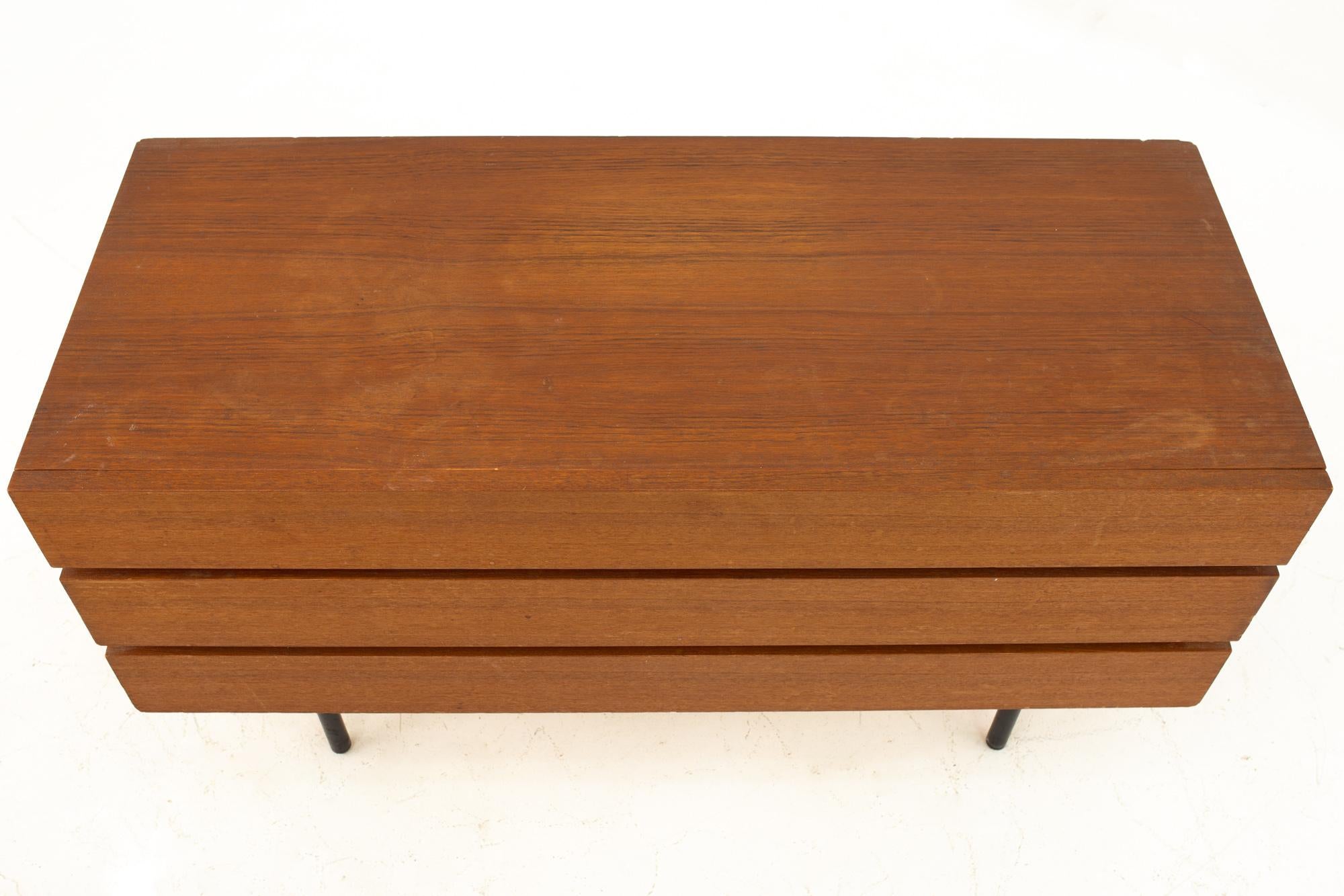 Danish Teak Mid Century 3 Drawer Dresser

Dresser measures: 39.5 wide x 16.5 deep x 20.5 high

This price includes getting this piece in what we call Restored Vintage Condition. That means the piece is permanently fixed upon purchase so it’s