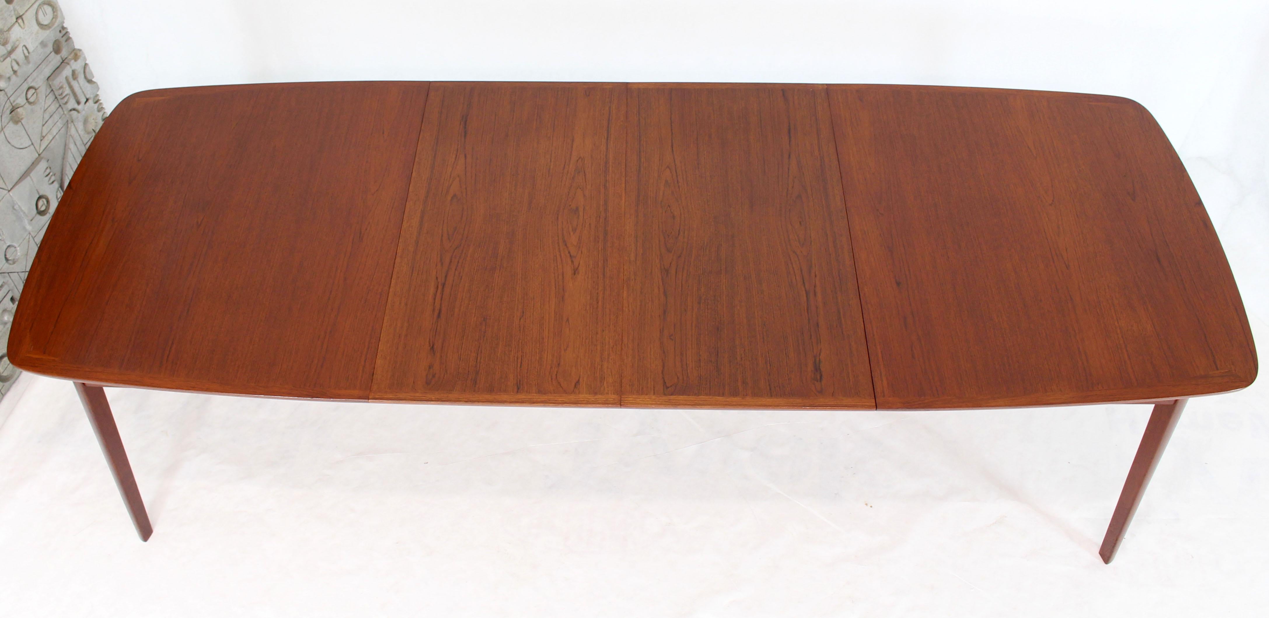 Danish Teak Mid-Century Modern Dining Banquet Table Self Storing Folding Leafs In Excellent Condition For Sale In Rockaway, NJ