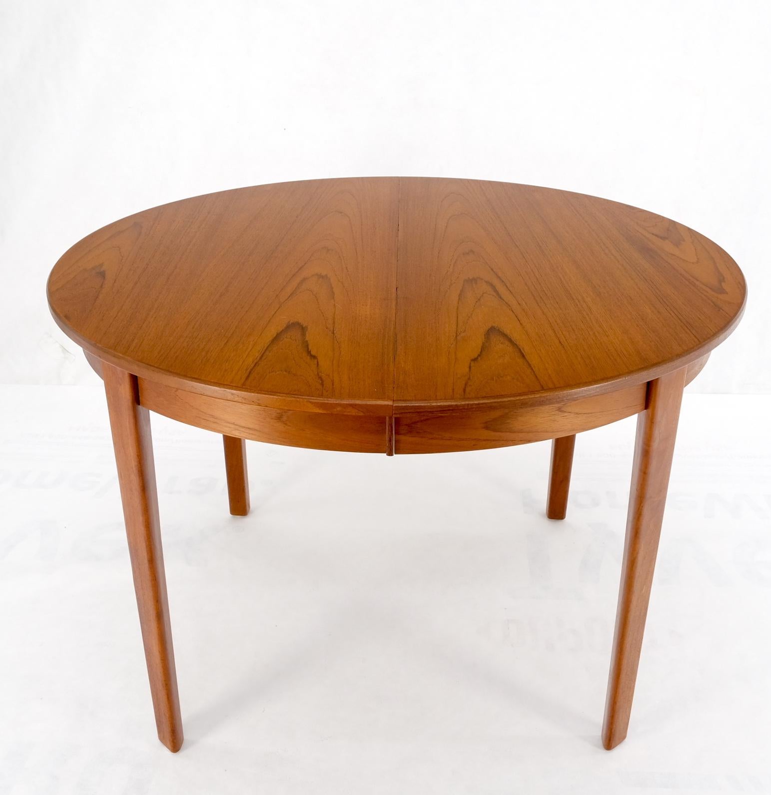 Danish Teak Mid Century Modern Round Dining Banquet Conference Table 4 Leaf MINT
Four leaves measuring 20 inches across.
 Total length combines to 123