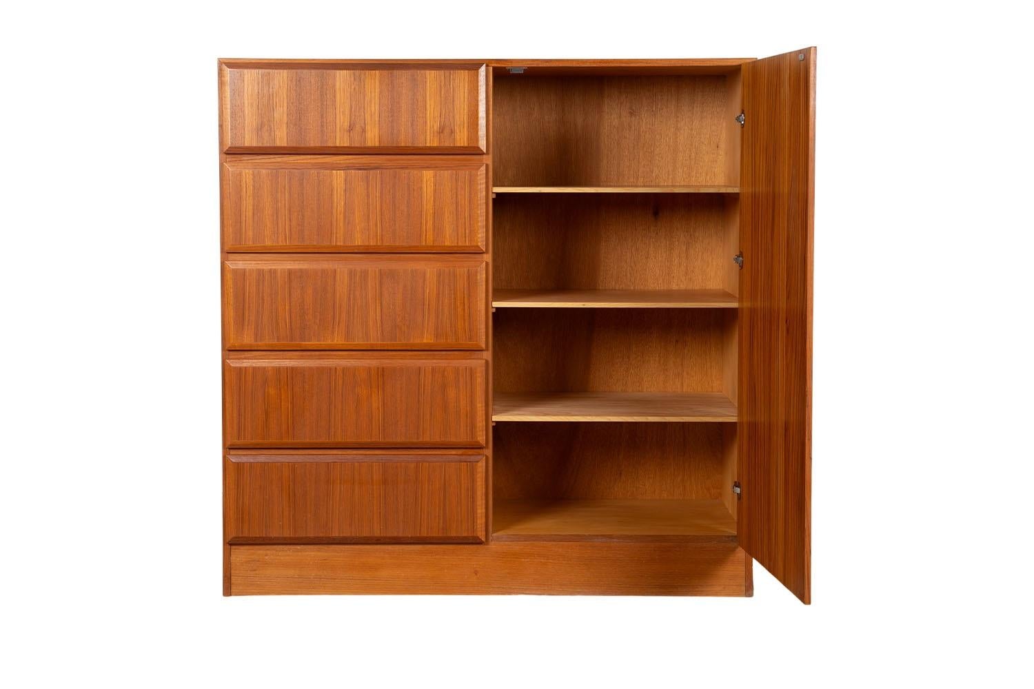 Beautiful mid-century modern highboy, gentleman’s tall dresser, wardrobe, circa 1970’s. Don’t be fooled by the term “Gentleman’s Chest” – this high functioning storage piece is really gender neutral, with plenty of storage making it well-suited as a