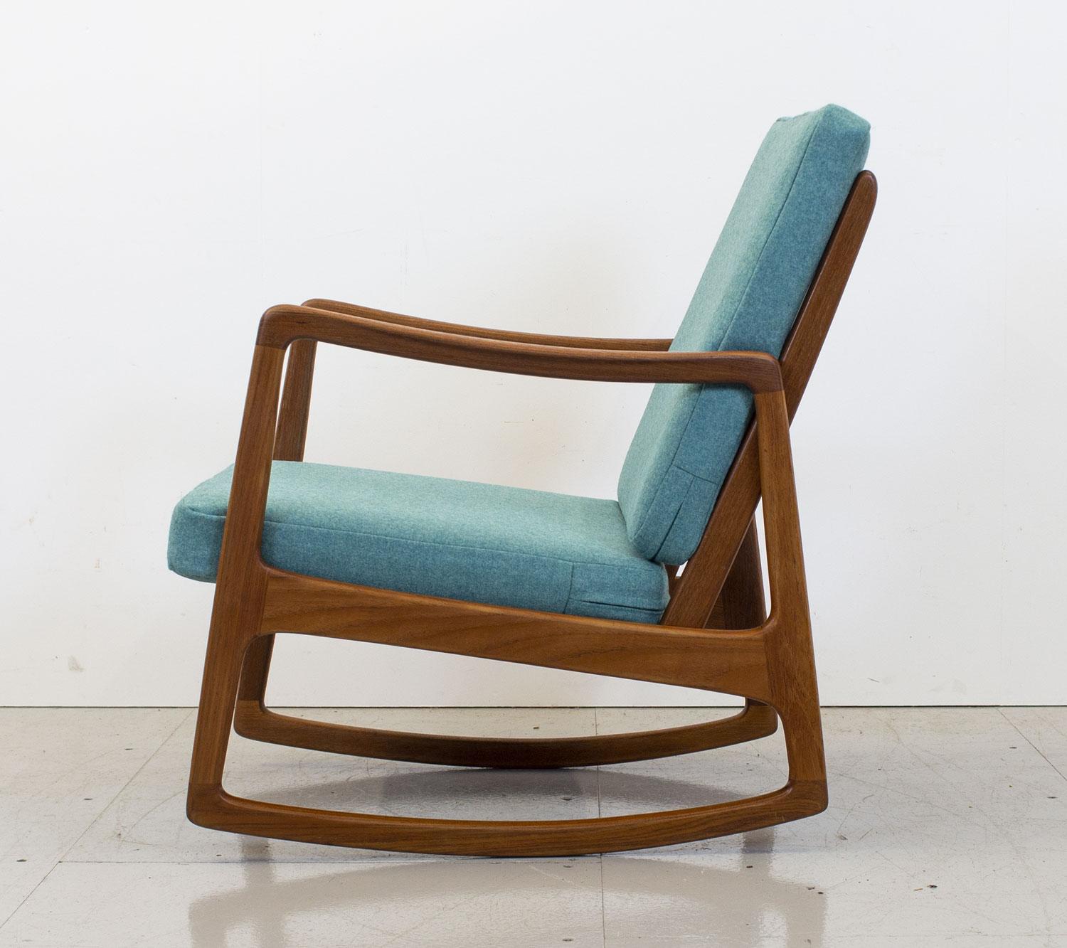 Danish teak model FD120 rocking chair designed by Ole Wanscher for France & Son in the early 1950s. Made from solid teak it’s clean lines and simple elegance were features Ole Wanscher was known for.