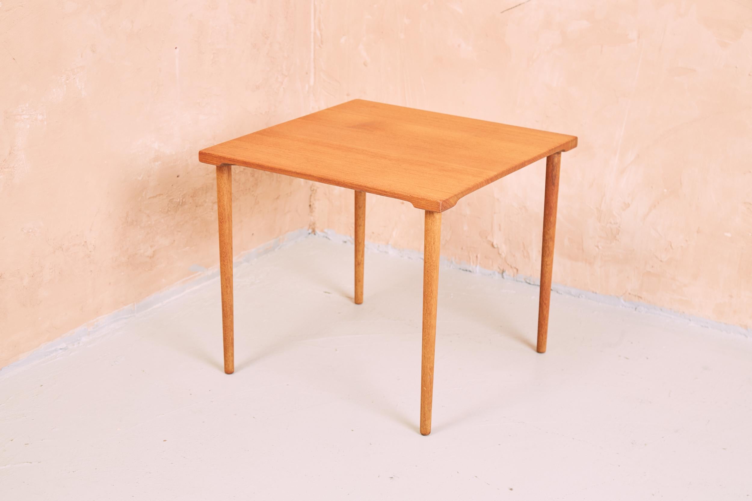 Danish model FD544 occasional side table by Edvard Kindt-Larsen for Danish manufacturer France & Son. Designed in the late 1950s and made of solid teak with shaped edges and turned legs it can be easily dismantled and flat packed for shipping.