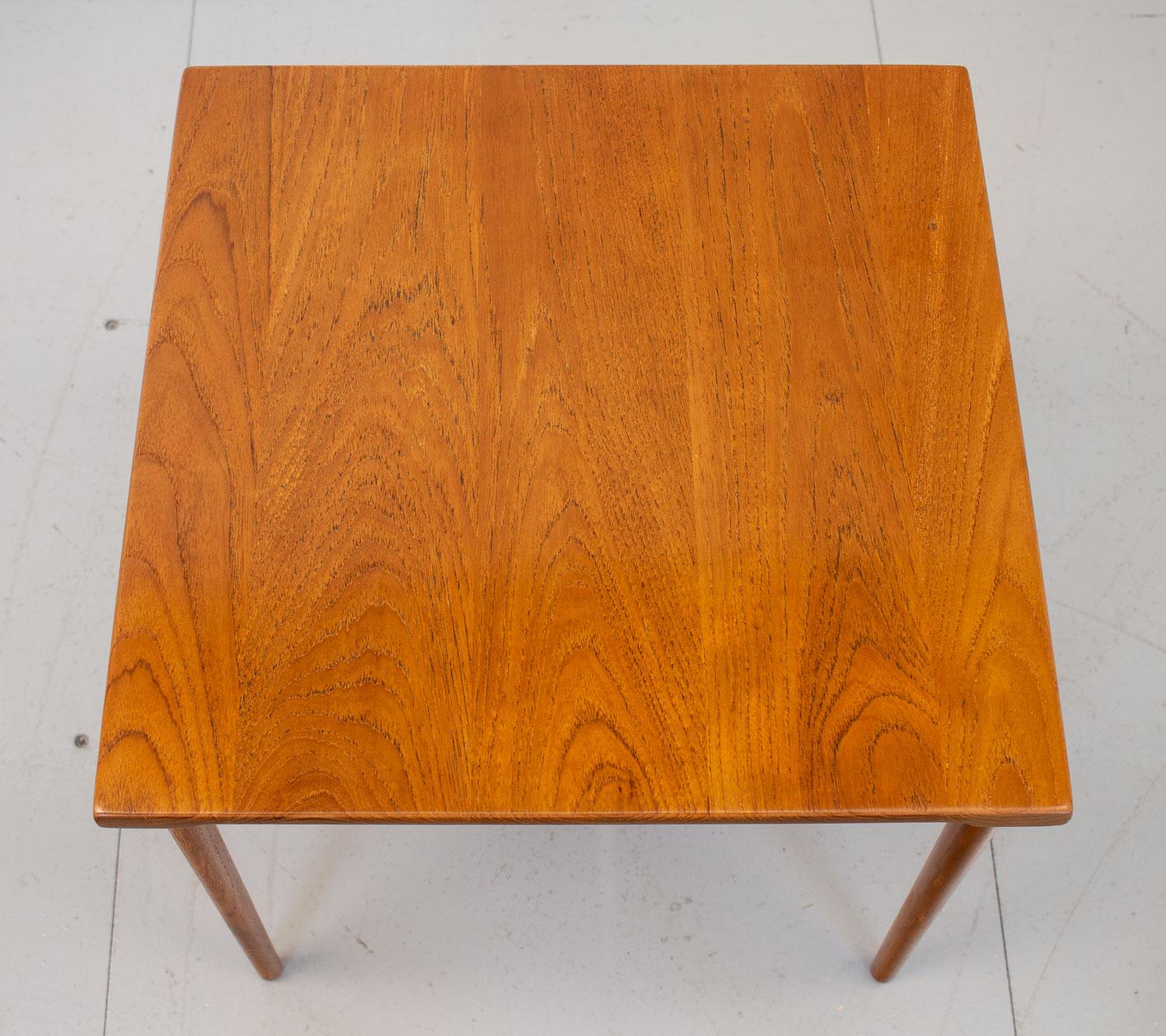 Danish model FD544 occasional side table by Edvard Kindt-Larsen for Danish manufacturer France & Son. Designed in the late 1950s and made of solid teak with shaped edges and turned legs it can be easily dismantled and flat packed for shipping.