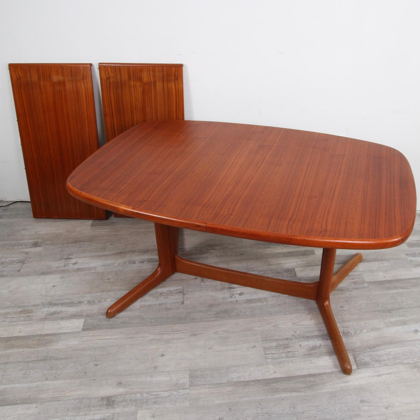 1960s Era teak expandable dining table with two 19.75