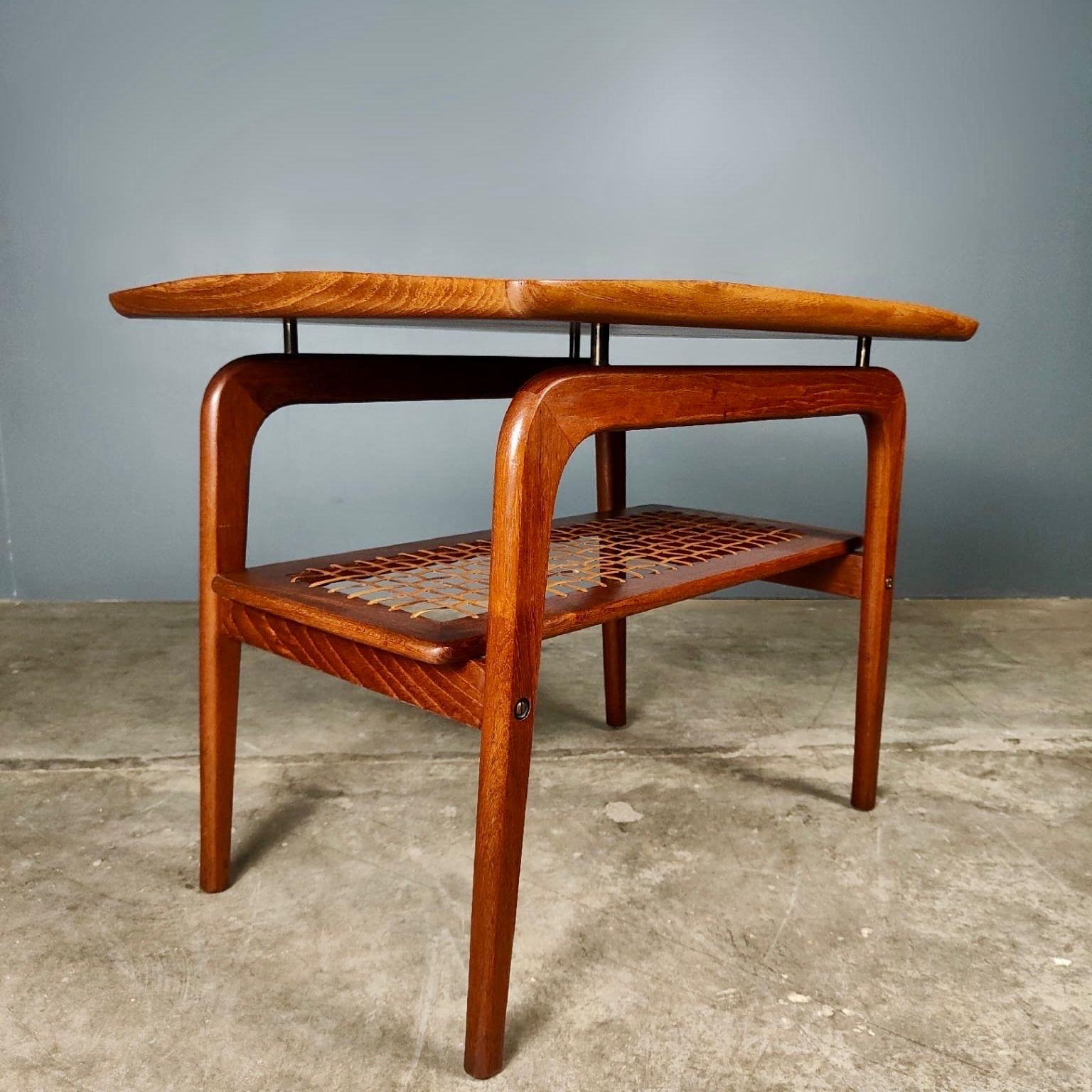 New Stock ✅

Mid Century Danish Teak Rattan Coffee Table By Arne Hovmand-Olsen For Mogens Kold

A rare and scarcely seen 1960s teak coffee or side table designed by Arne Hovmand Olsen and manufactured by Mogens Kold in Denmark

The perfect item to